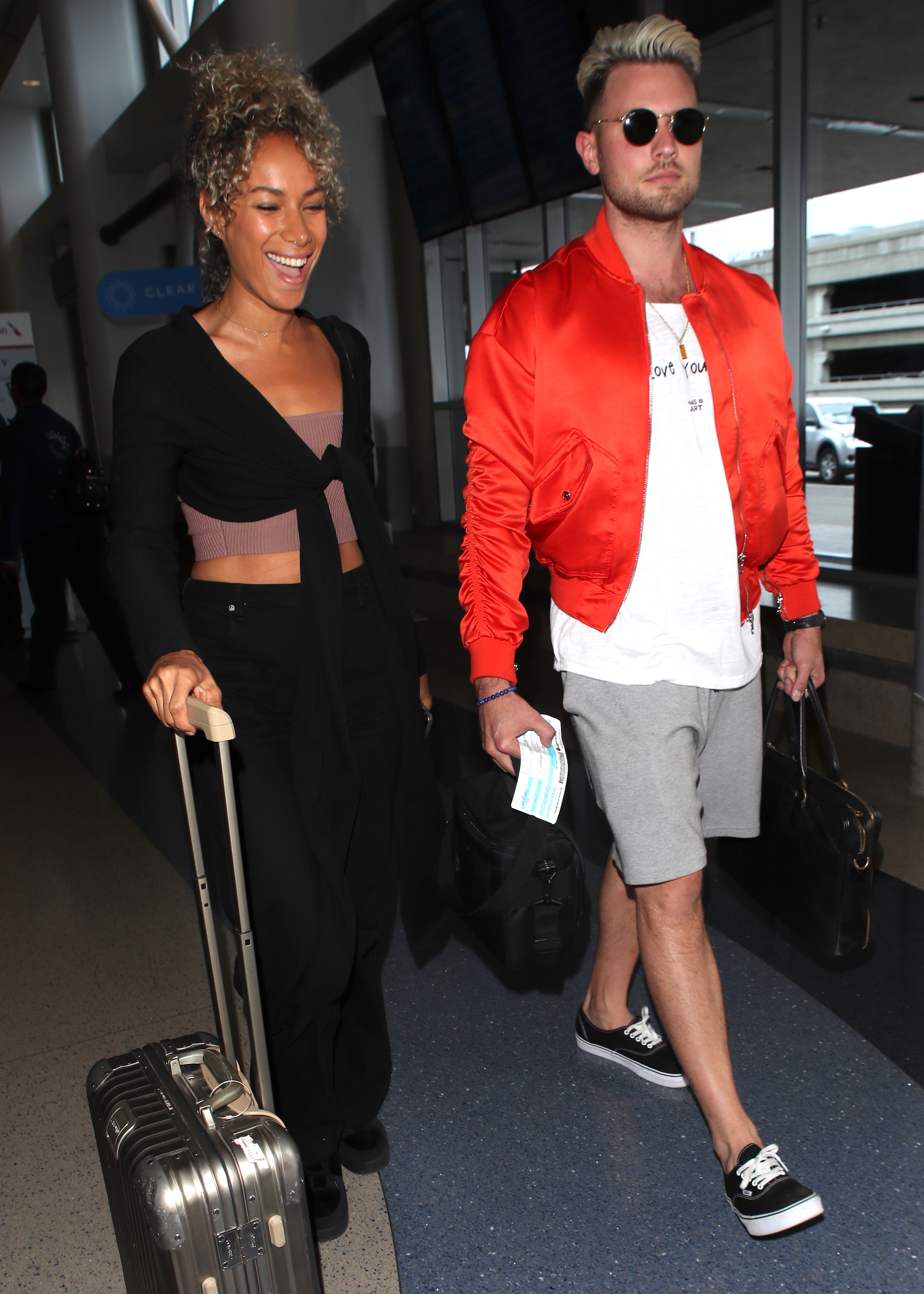Leona Lewis and her husband in the airport