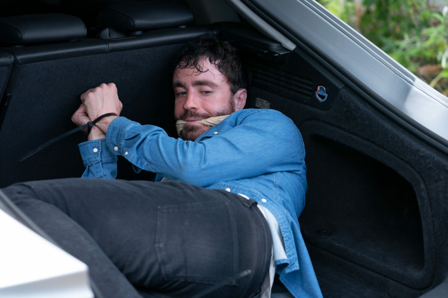 Lewis is tied up in EastEnders