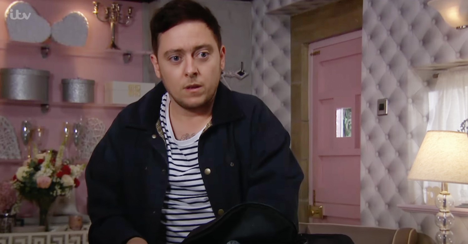 Matty striped shirt dark jacket Emmerdale