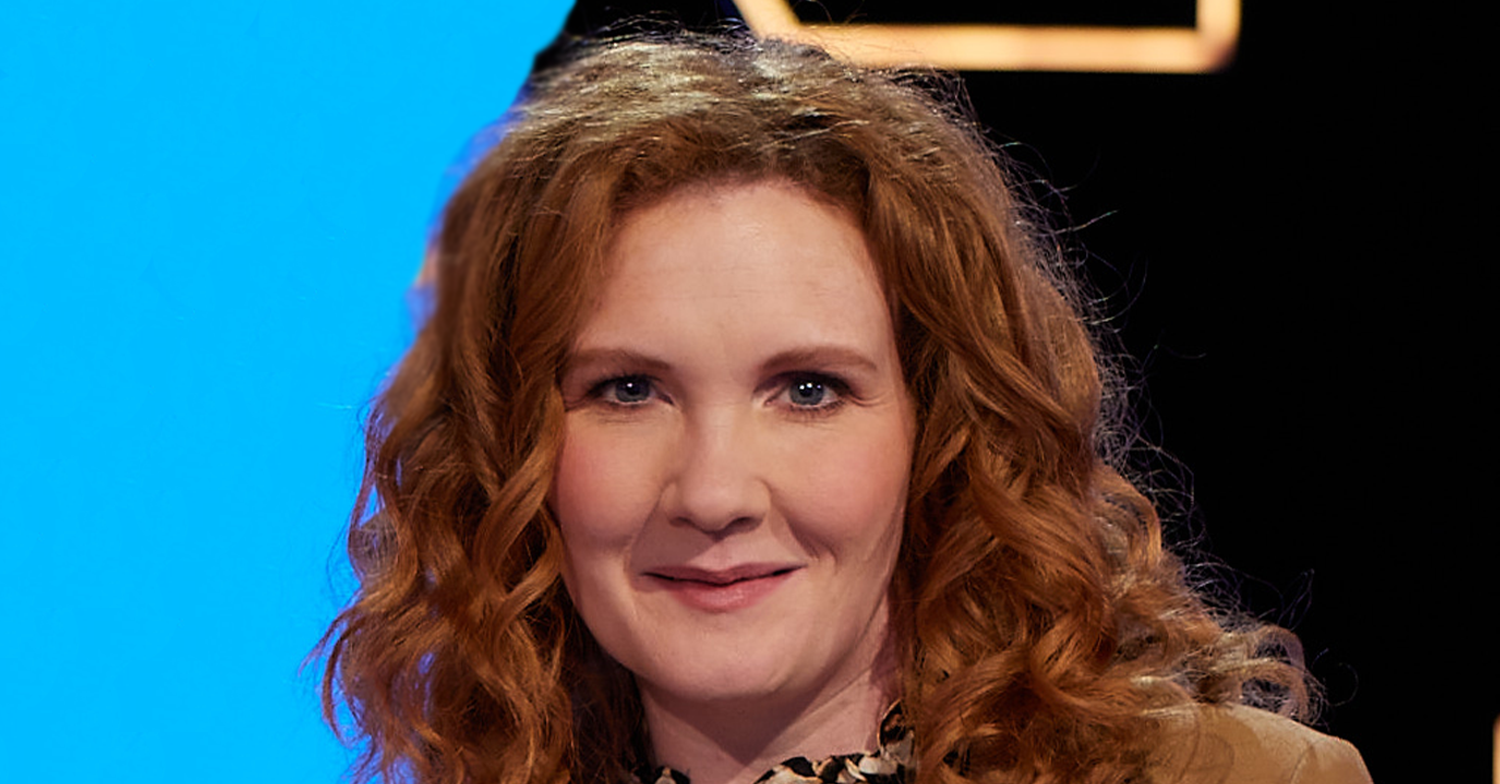 Jennie McAlpine smiling on a quiz show