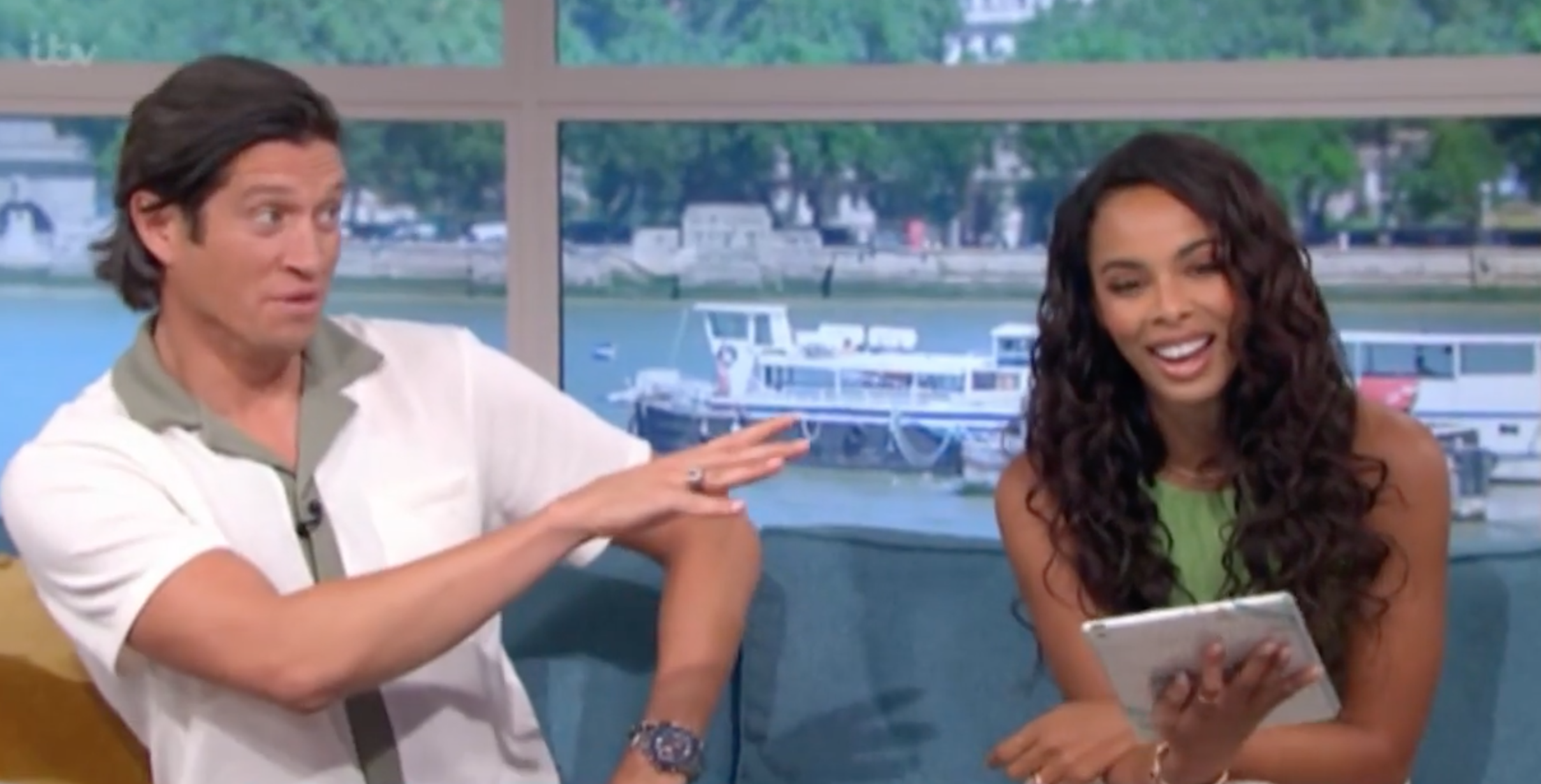 Vernon Kay pointing and Rochelle laughing