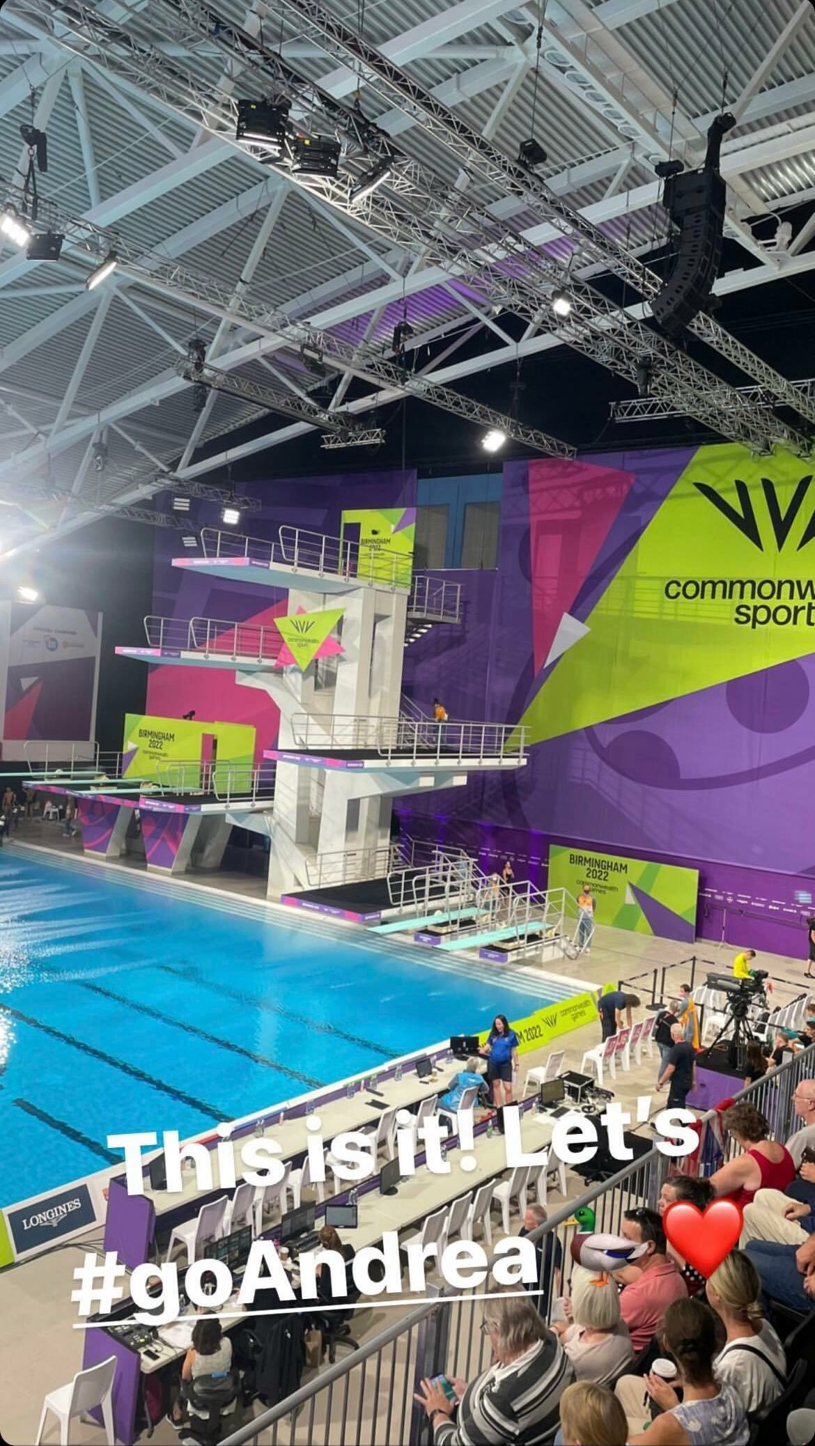 Picture of 2022 Commonwealth Games diving pool with white writing which states "This is it! Let's #goAndrea'