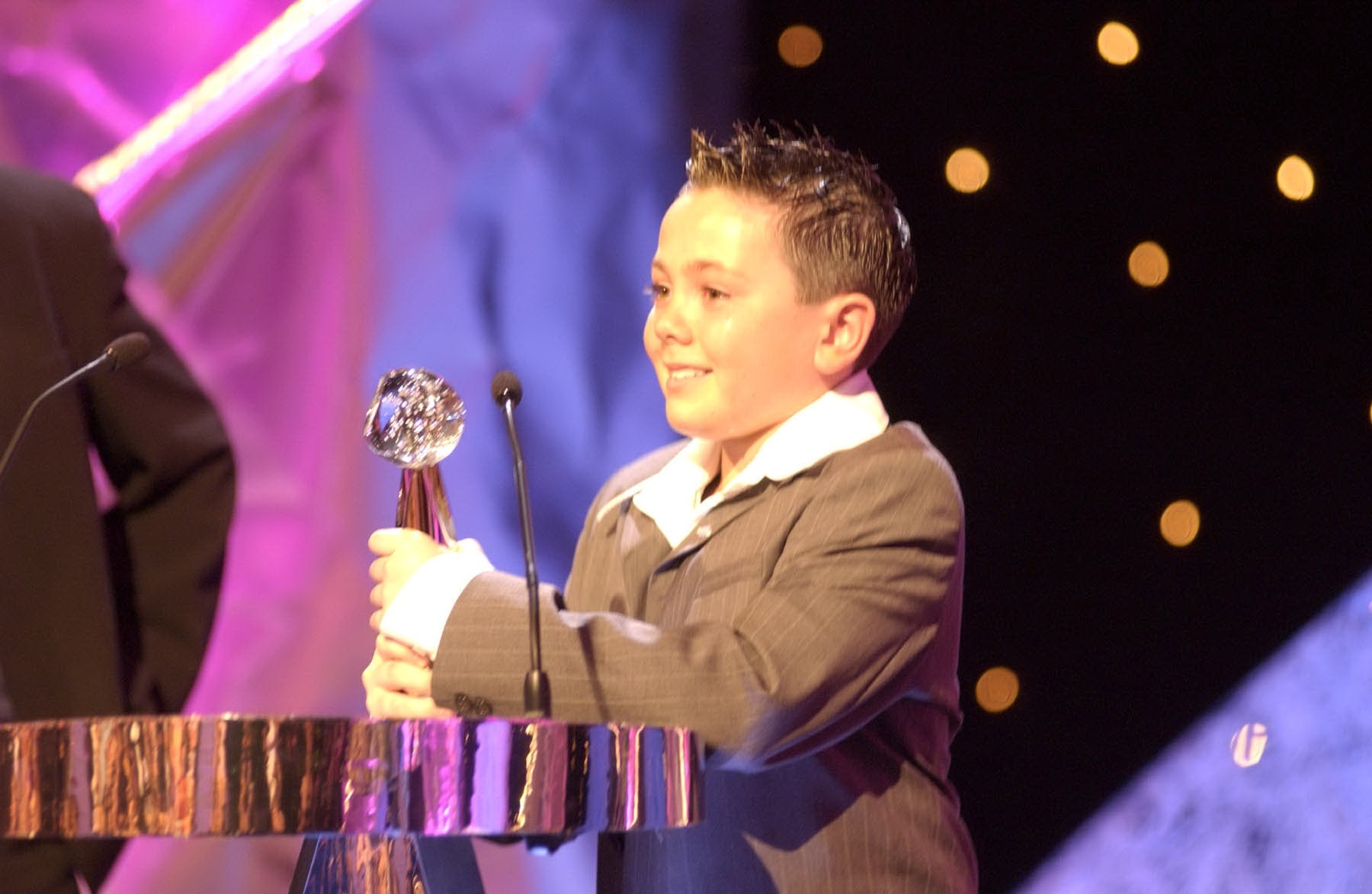 Ray Quinn winning an award as a little boy