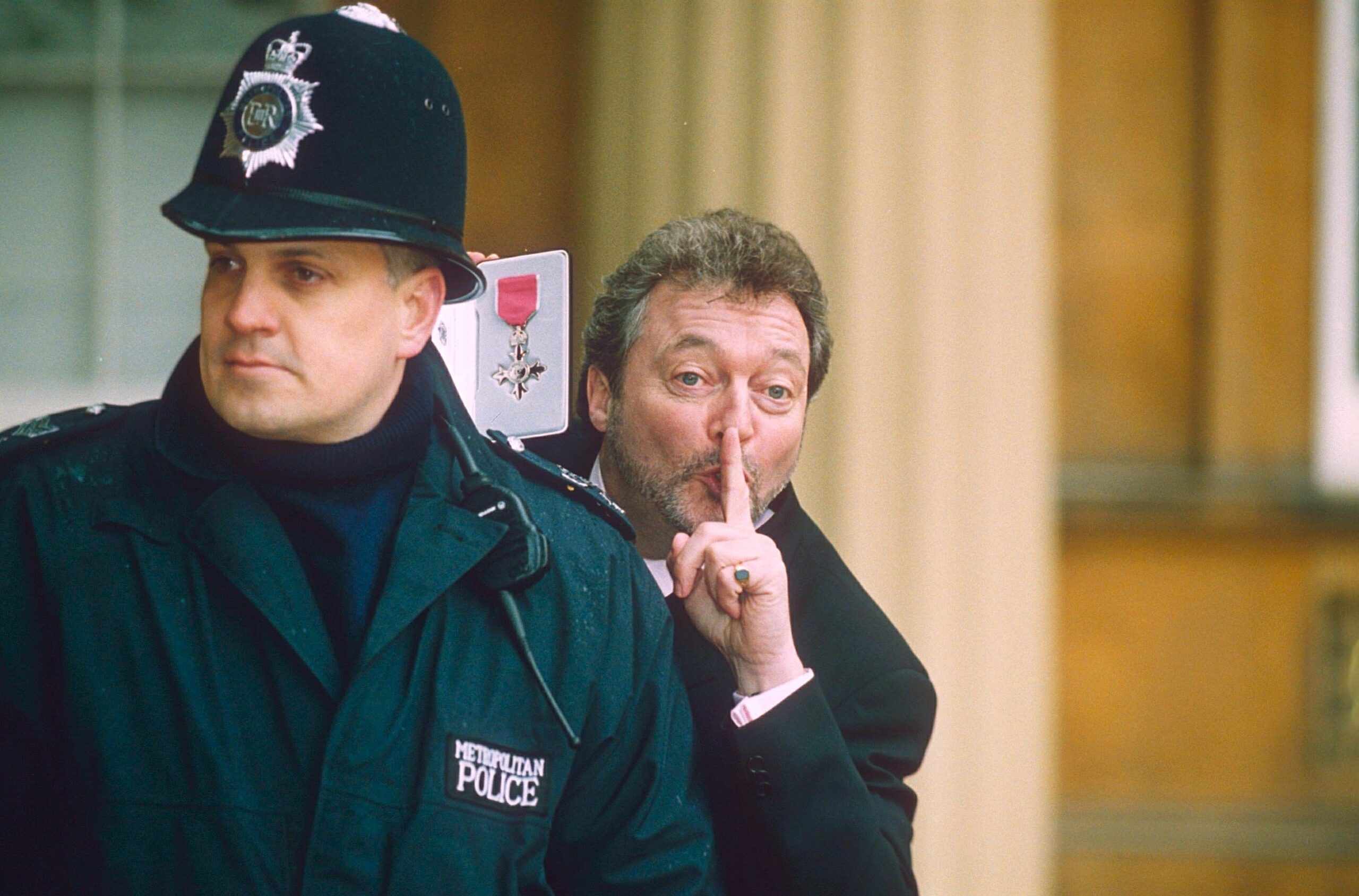 Jeremy Beadle with a policeman