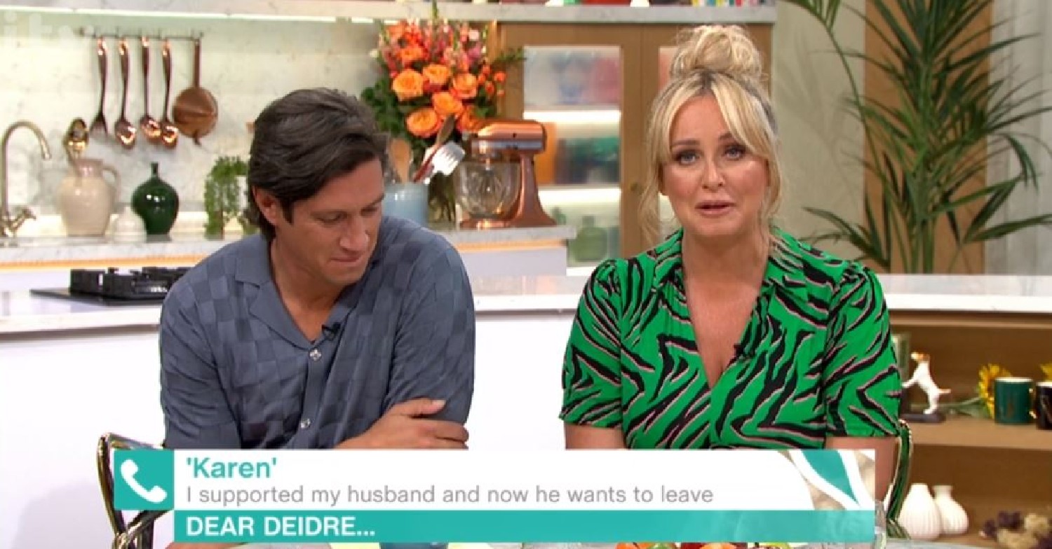 Vernon Kay looks down next to Josie Gibson on This Morning today