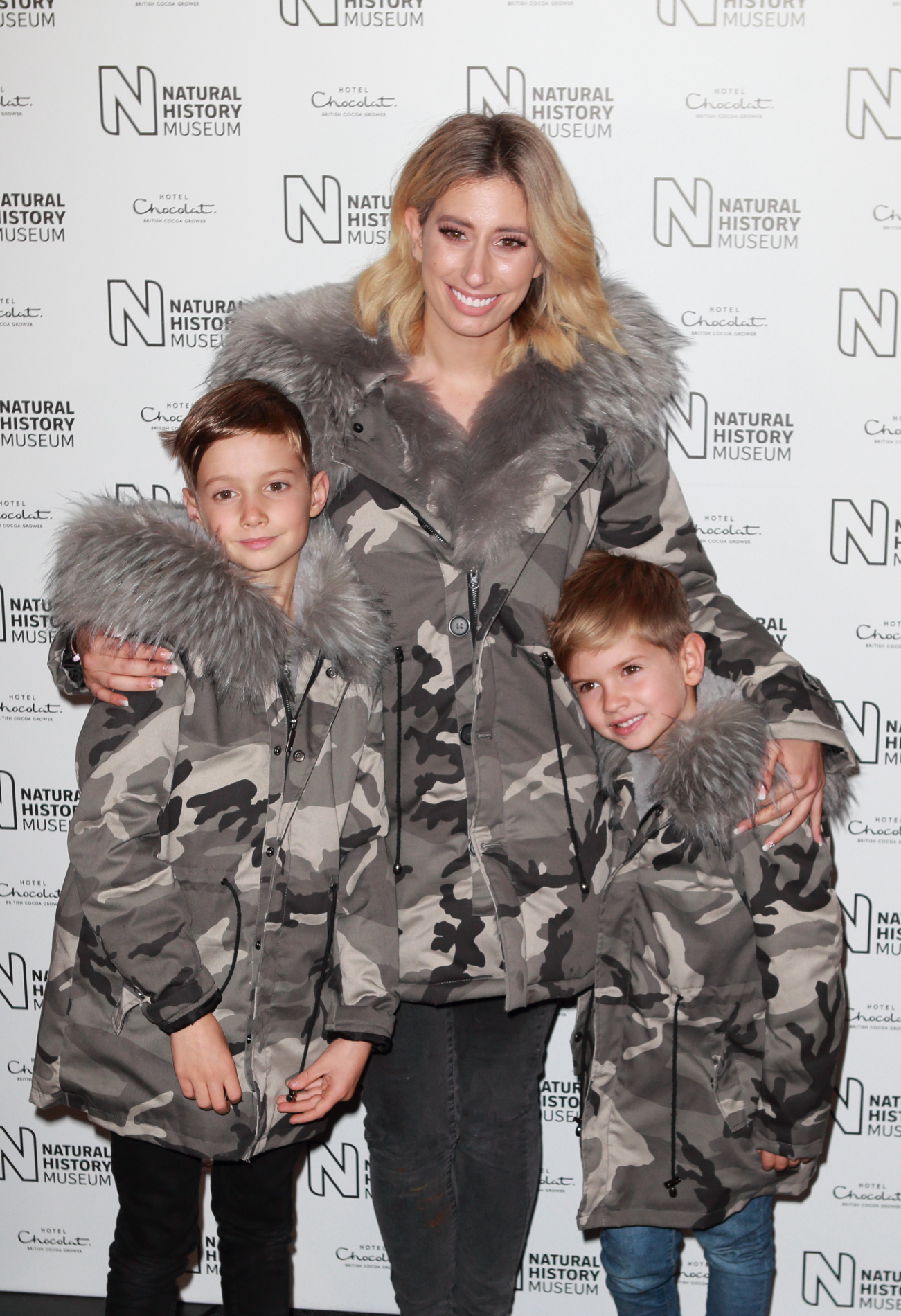 Stacey Solomon smiles with her children Zach and Leighton.