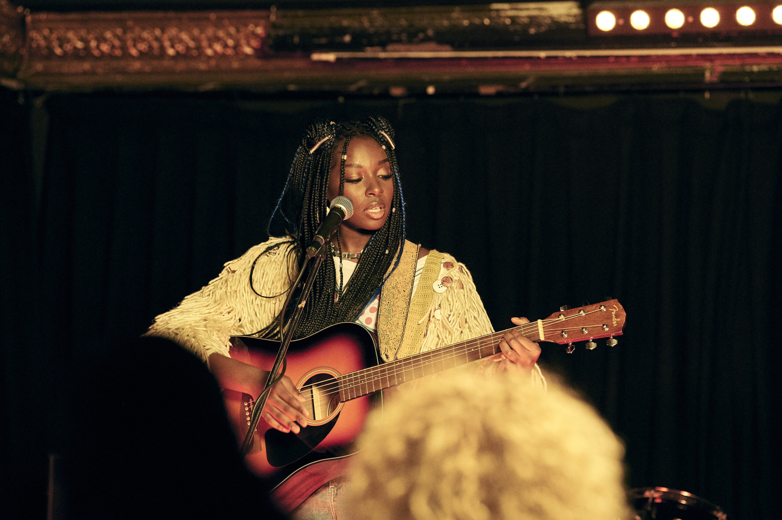 Chantelle Alle as Jessica, she sings and plays guitar on Marriage on BBC One