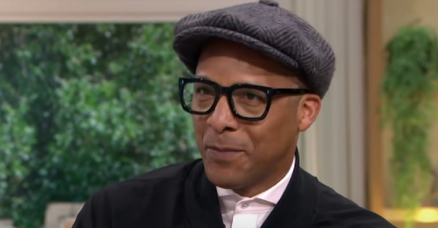 Jay Blades speaking with glasses and a hat on on This Morning