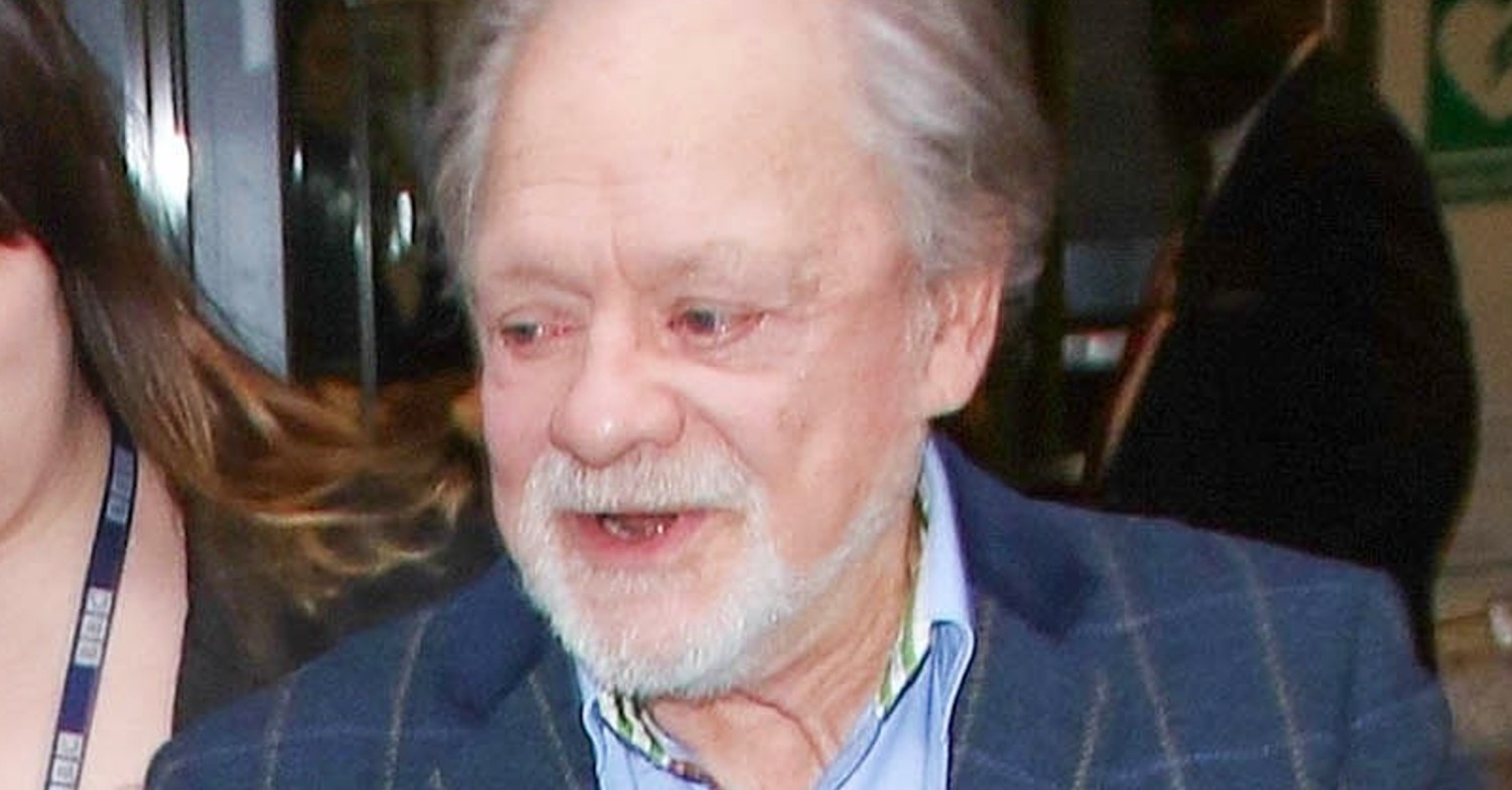 Sir David Jason smiling while wearing a navy jacket