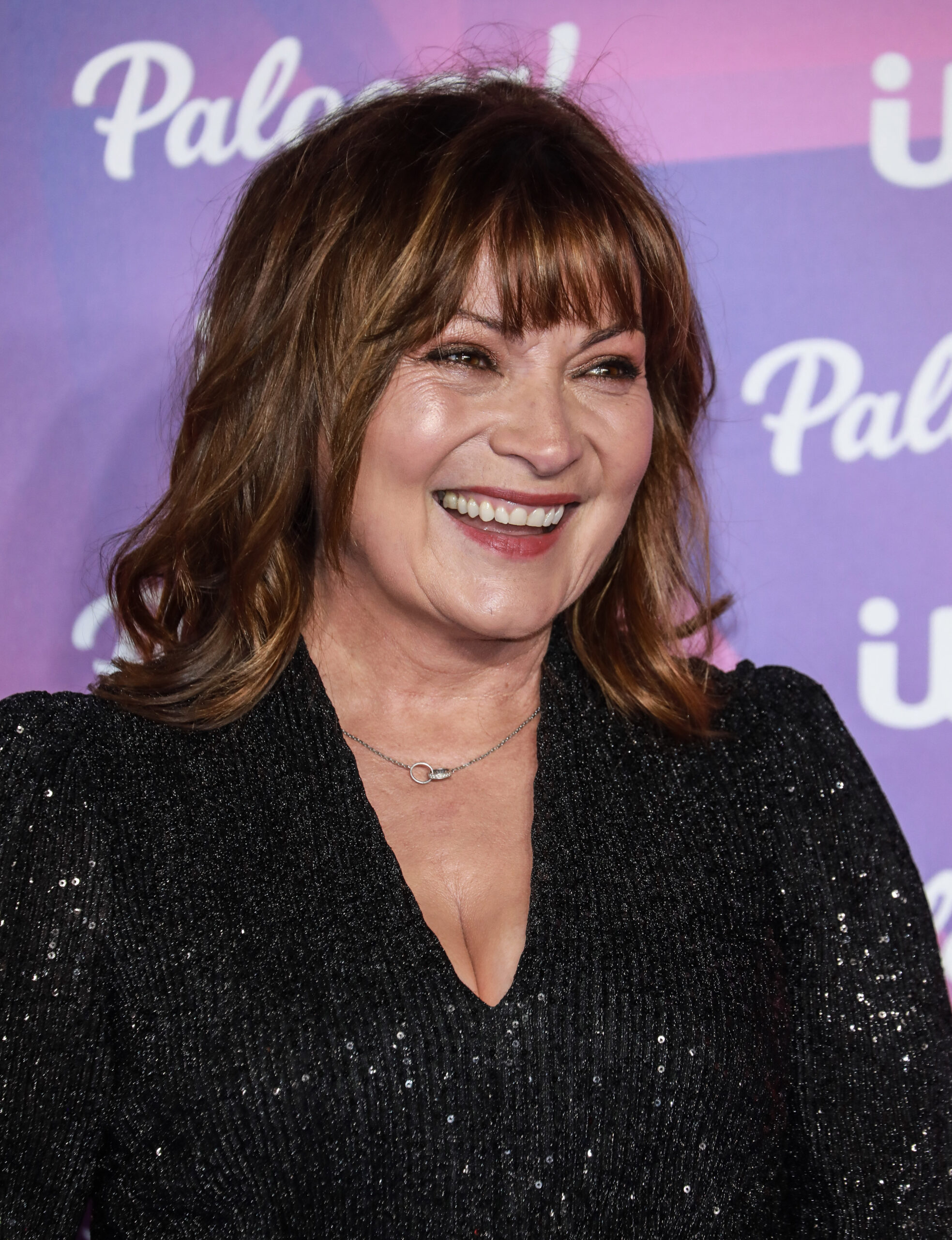 Lorraine Kelly smiles on red carpet at ITV Palooza
