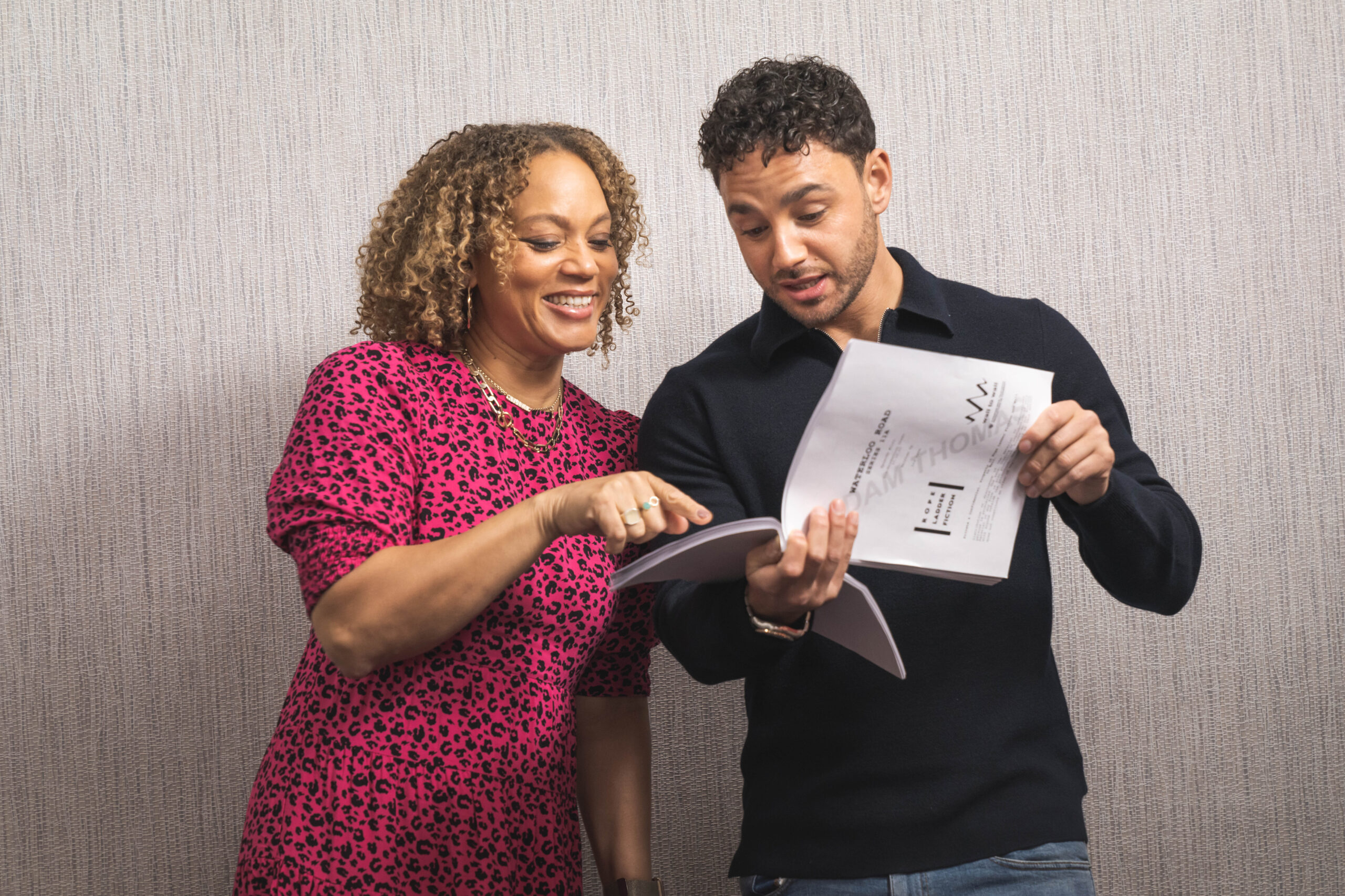 Soap stars Angela Griffin and Adam Thomas read scripts together on the set of the Waterloo Road revival