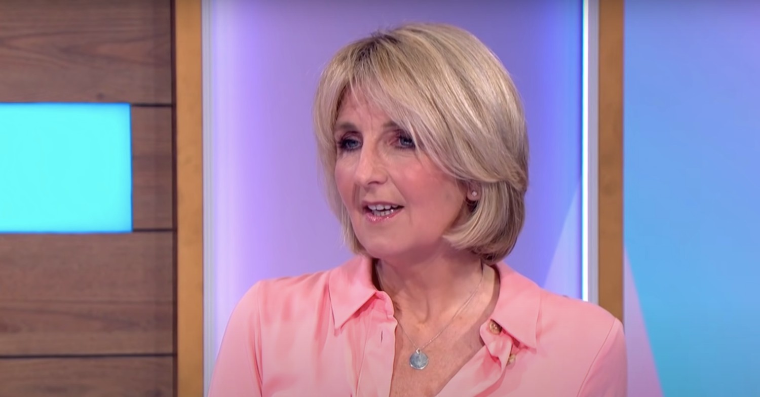 Kaye Adams wearing a pink shirt on Loose Women