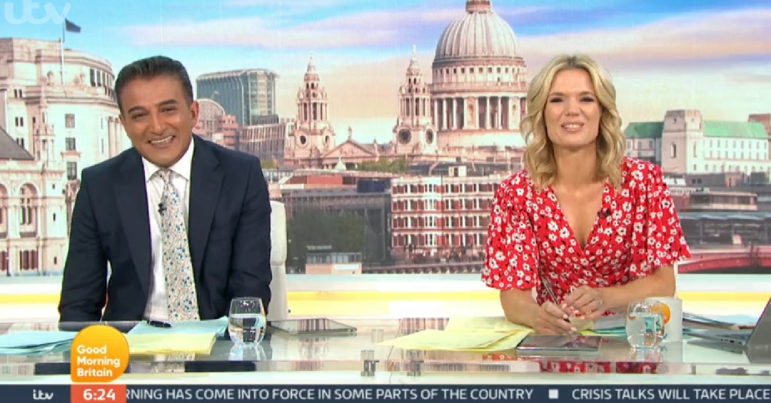 Adil Ray smiling alongside Charlotte Hawkins on GMB today