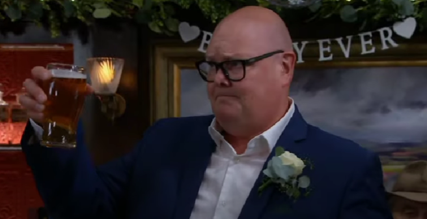 Paddy raising a toast to Rhona and Marlon