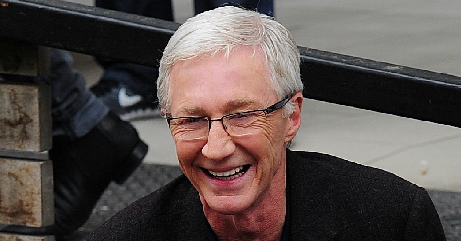 Radio 2 host Paul O'Grady smiling outside ITV Studios