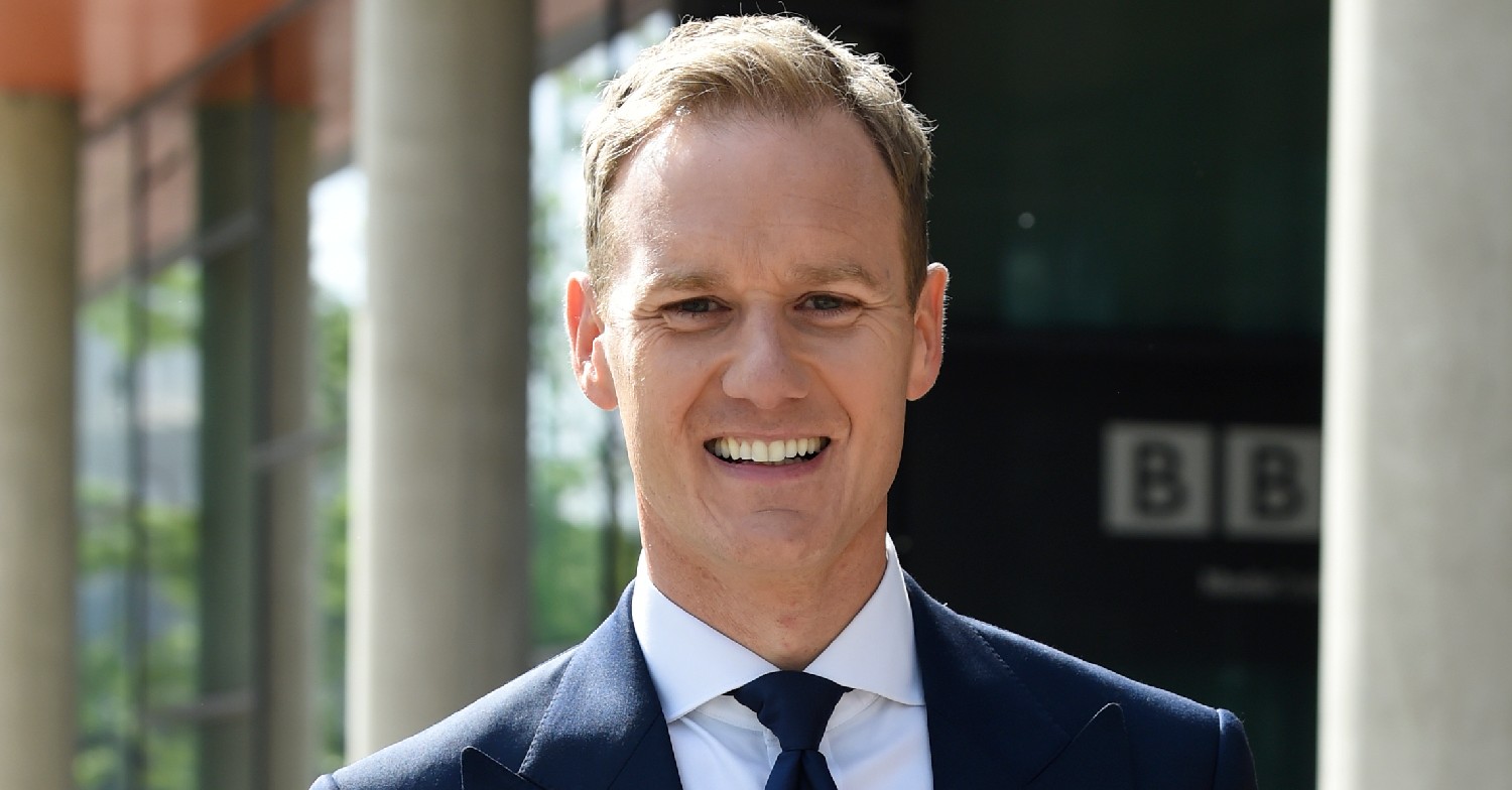 Dan Walker smiles outside BBC studios