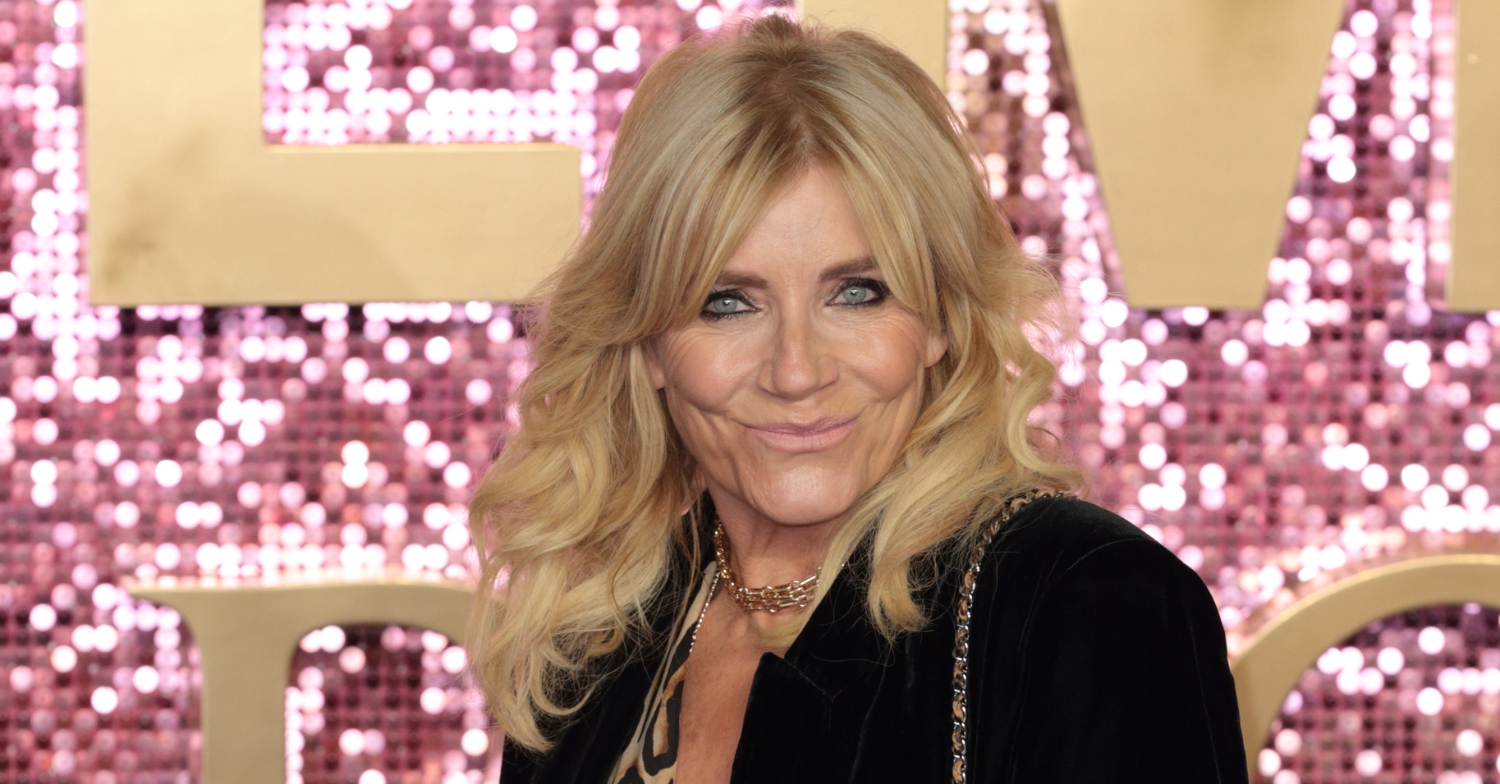 Michelle Collins smiles to camera