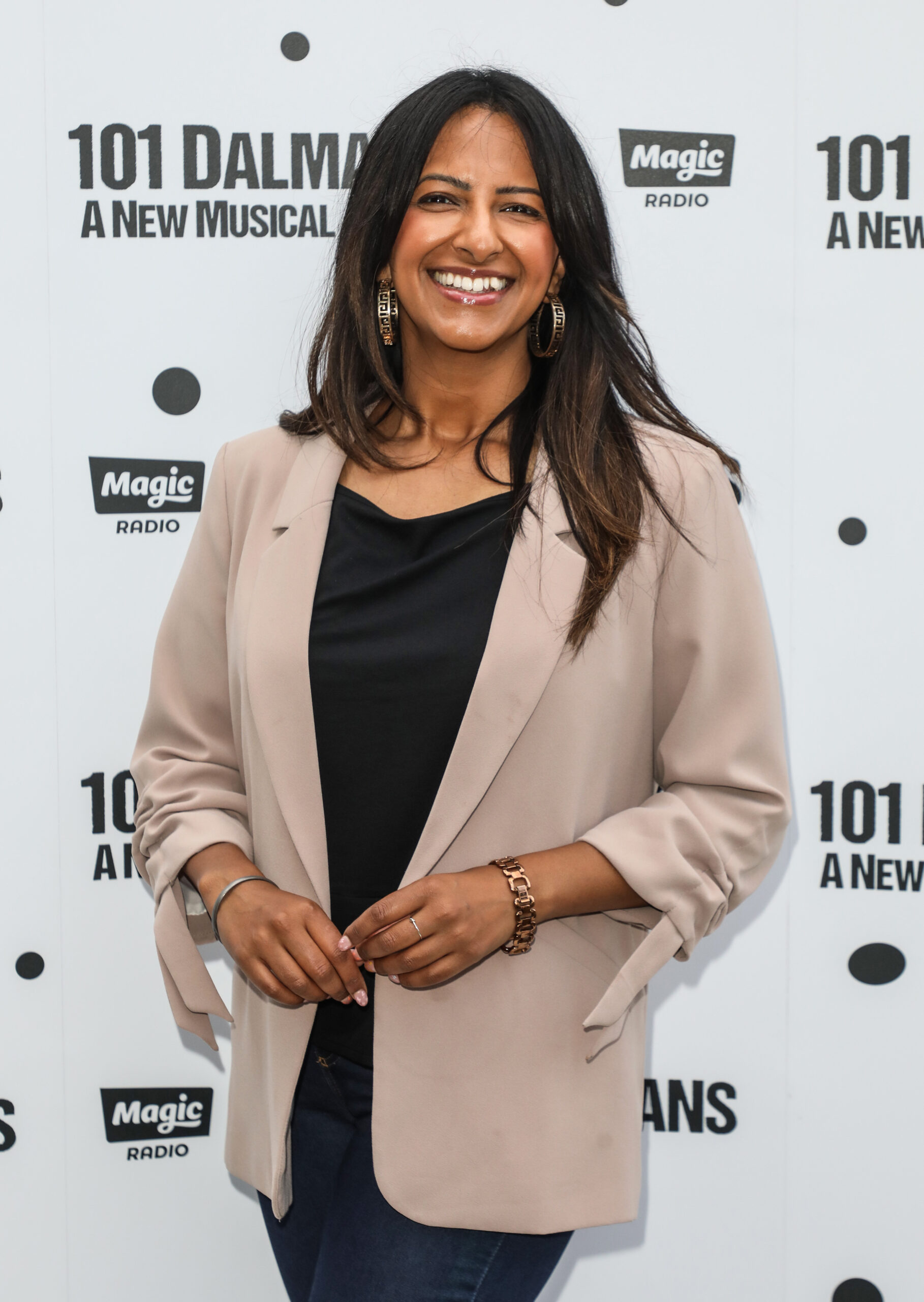 Ranvir Singh smiles at the Press Night For 101 Dalmations: A New Musical