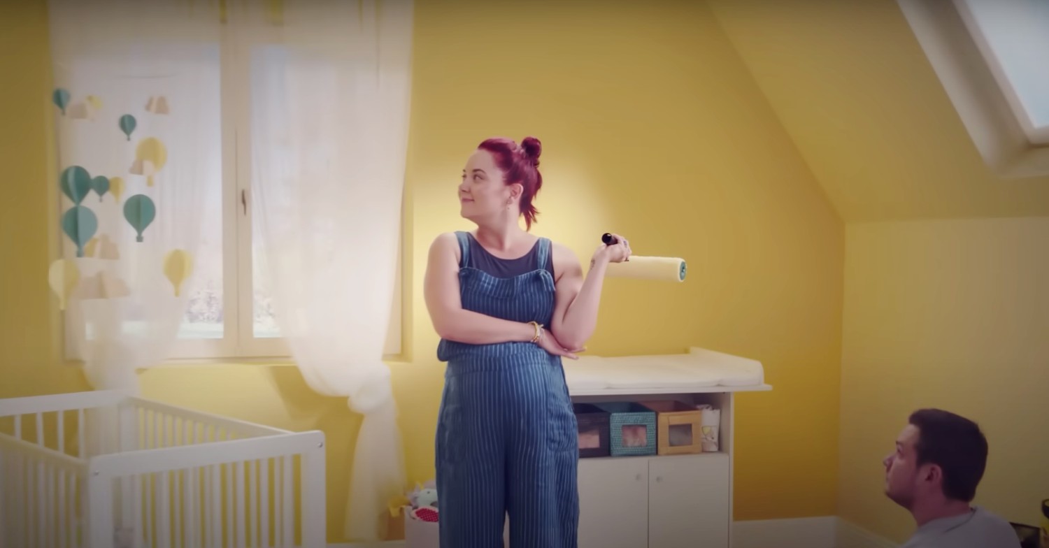 Hannah and Dave painting their spare room in the Crown Paints advert