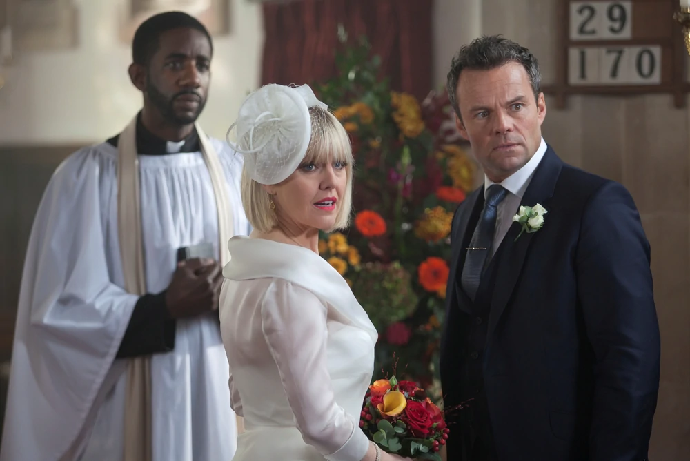 Agatha and James at the alter