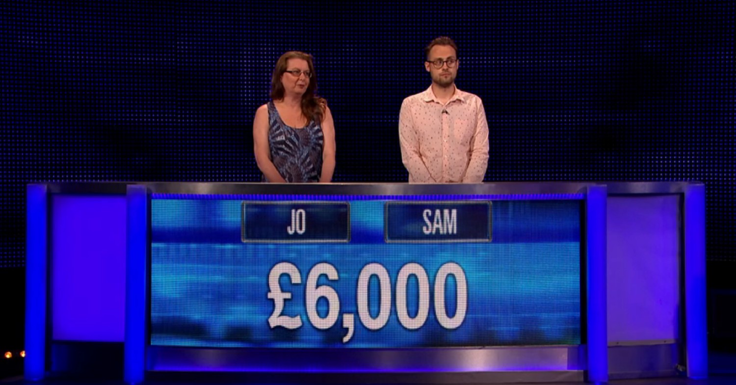 Jo and Sam stood behind the panel on The Chase