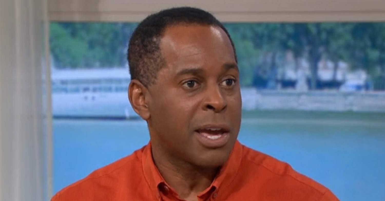 Andi Peters looks serious while talking on This Morning
