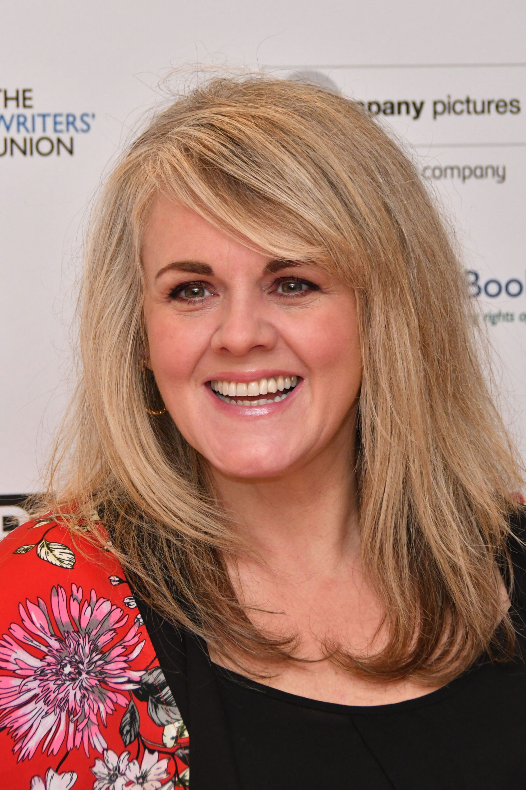 Sally Lindsay smiles at the Writers' Guild Awards 2020
