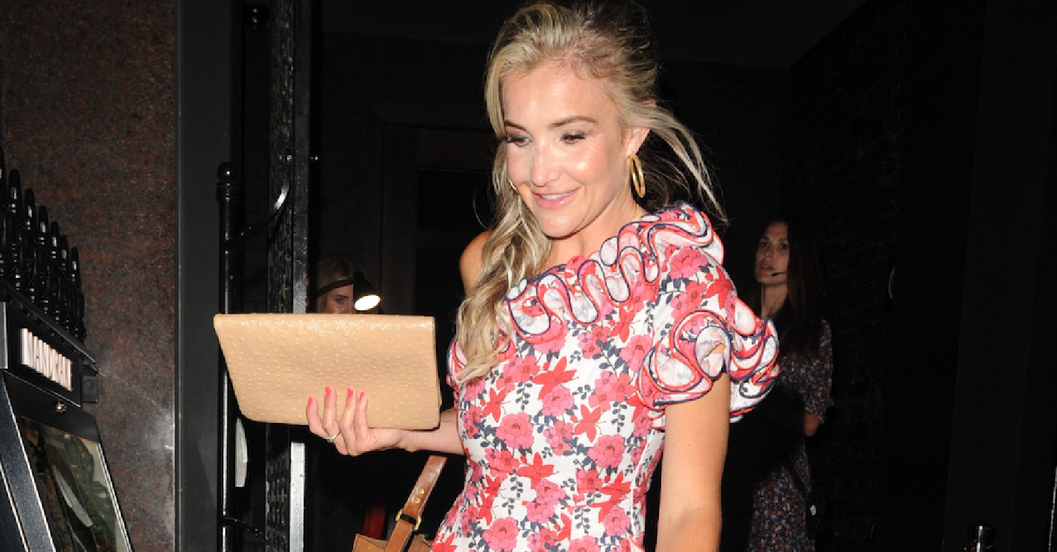 Helen Skelton on night out in one shoulder dress and holding a clutch