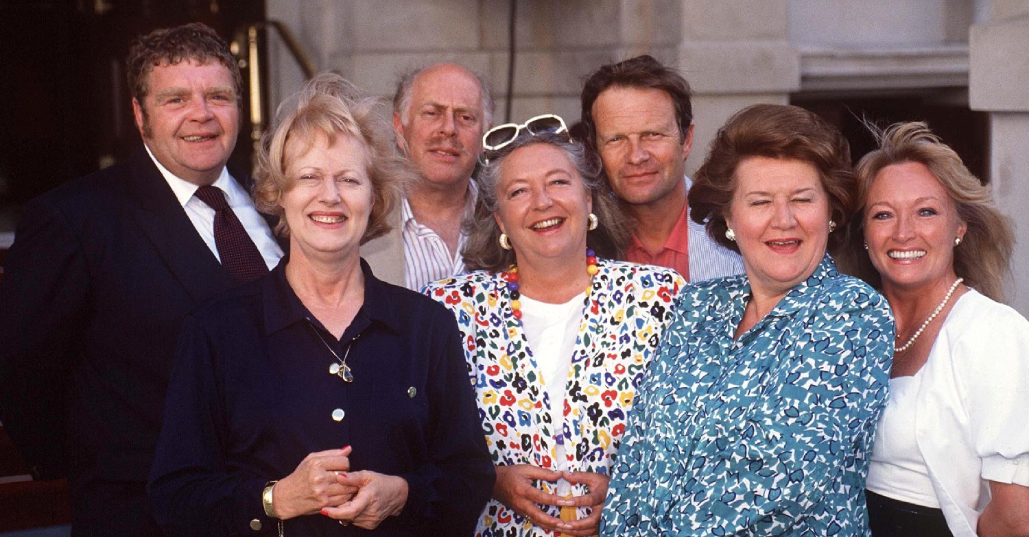 Josephine Tewson and the cast of Keeping Up Appearances smiling