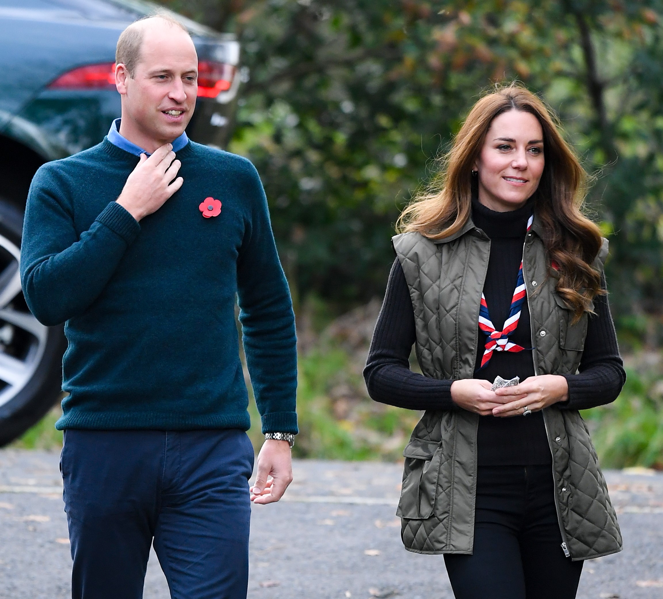Prince William and Kate Middleton smiling during royal engagement