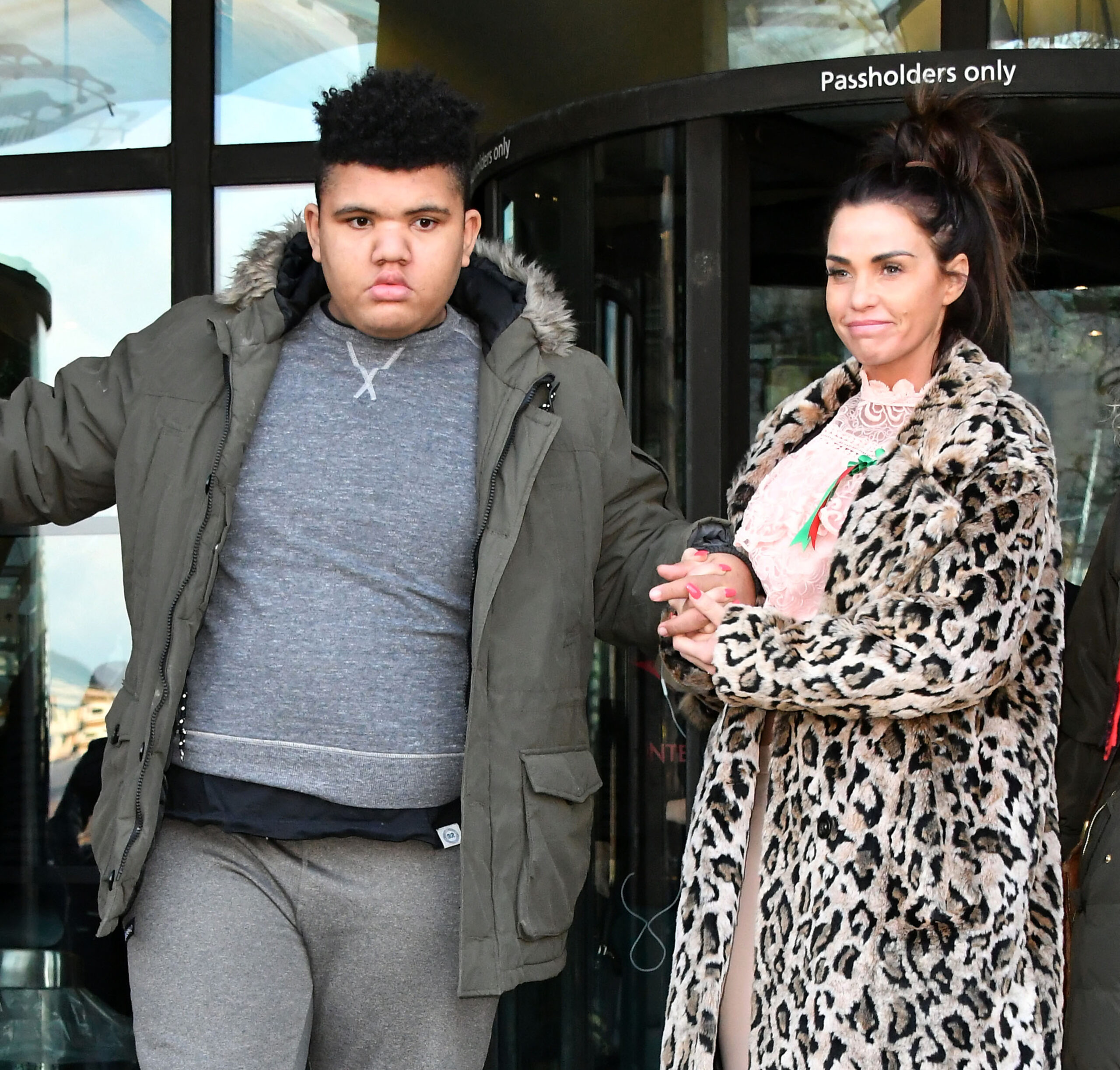 Picture of Katie Price and her son Harvey leaving a hotel.