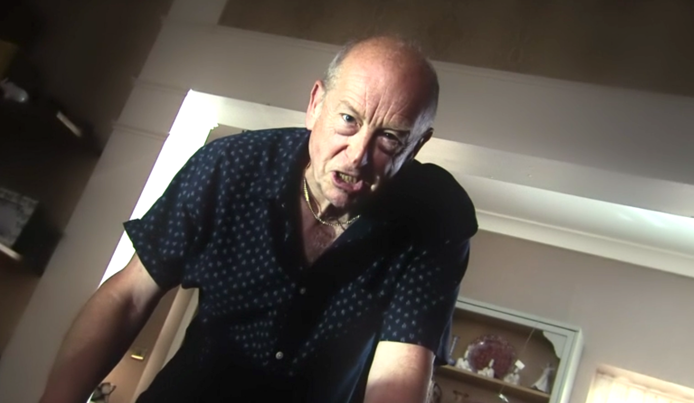 Coronation Street Geoff leans over Yasmeen