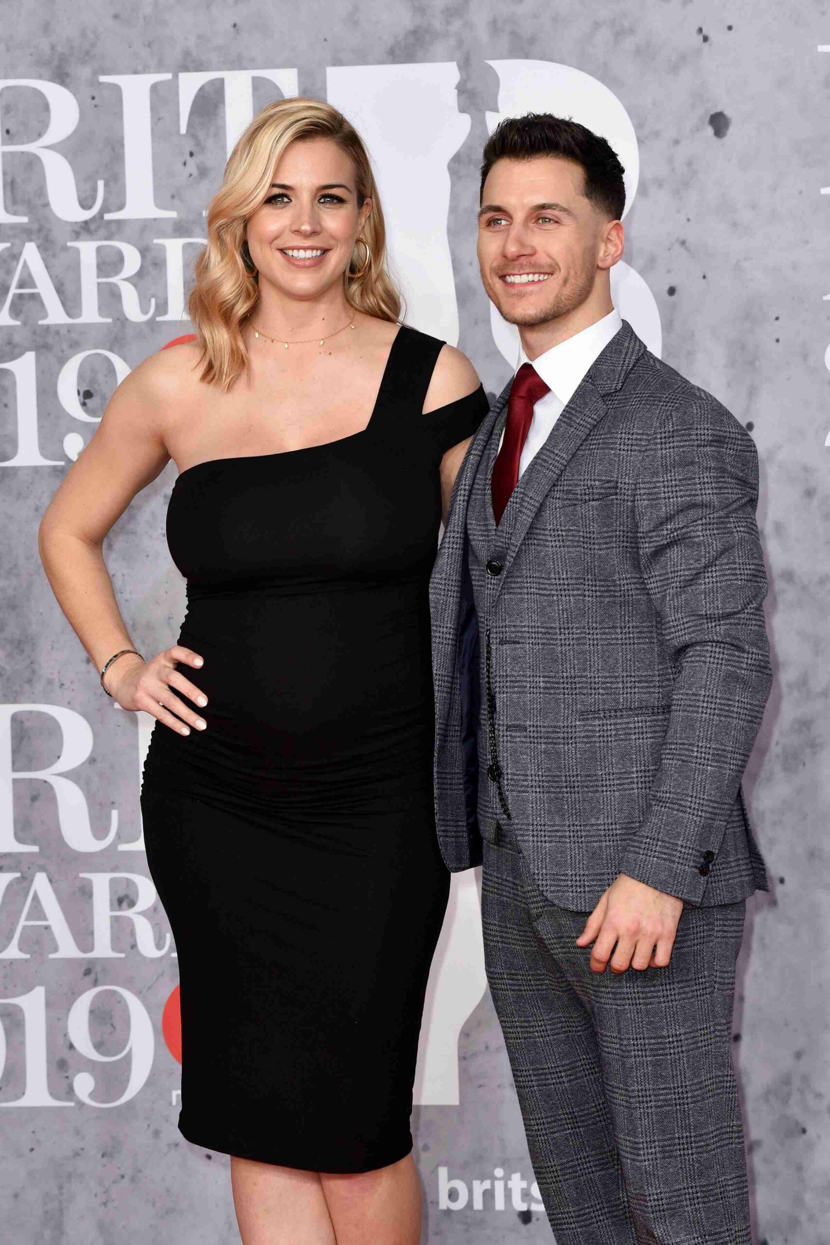 Gemma Atkinson and Gorka Marquez smiling at BRITs