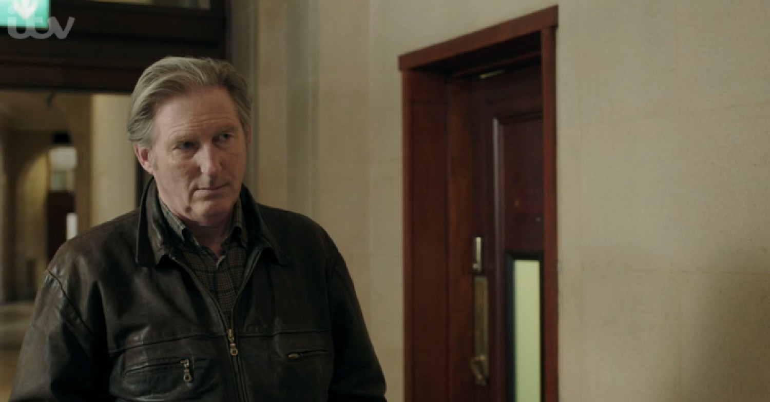 Adrian Dunbar looking serious in Ridley 