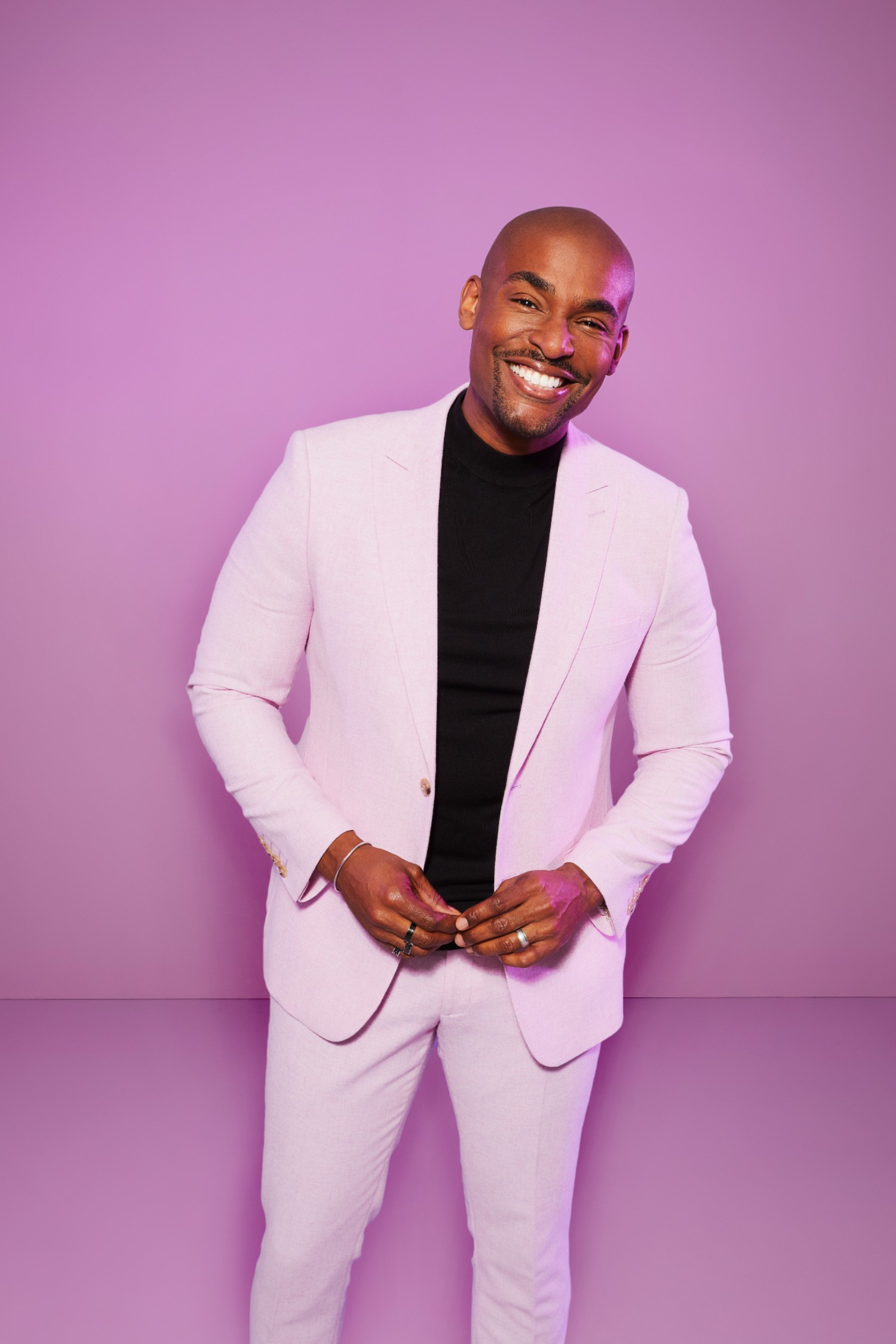 Paul C Brunson in a pink suit on MAFS UK