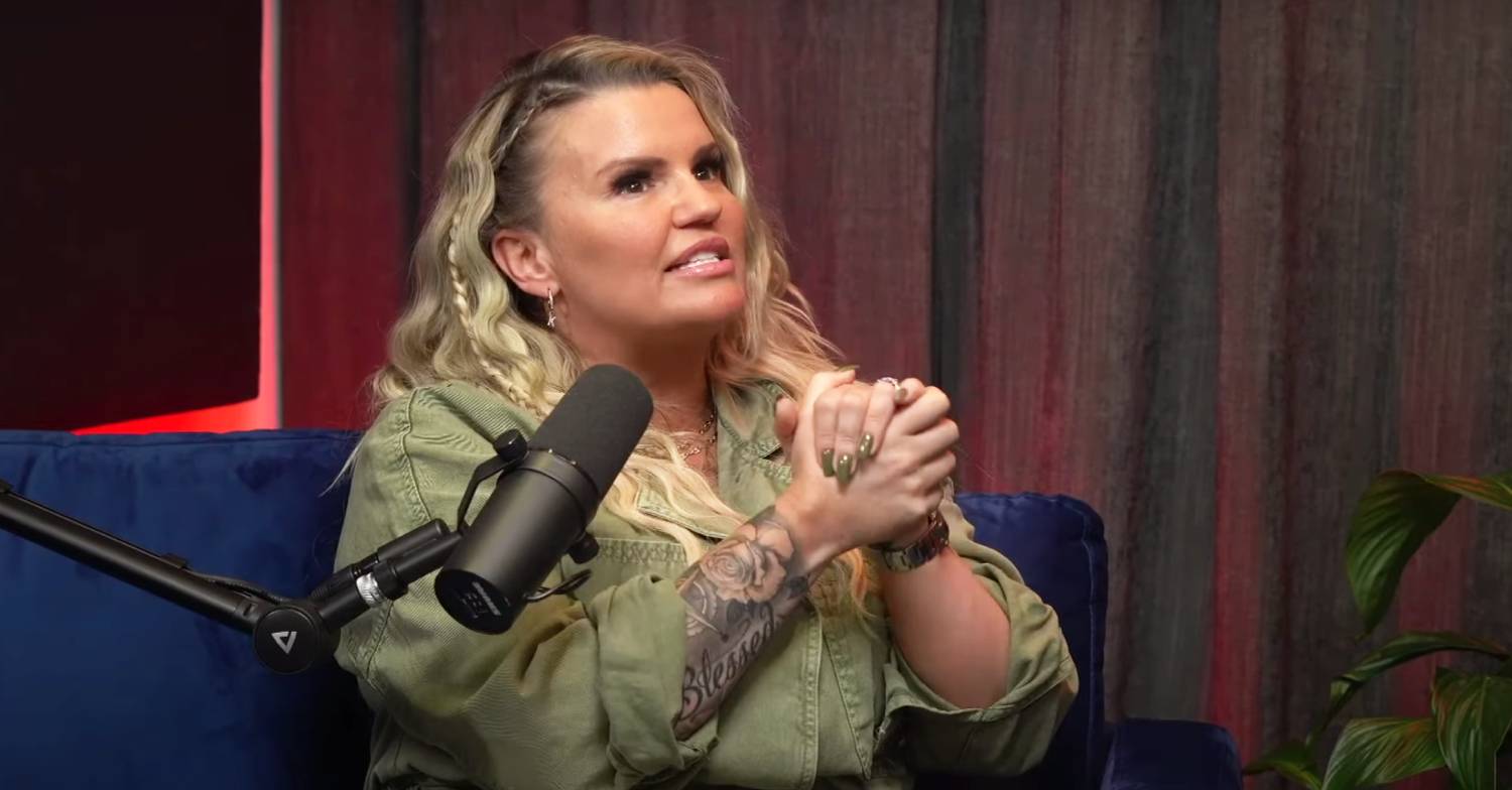 Kerry Katona clasps her hands together