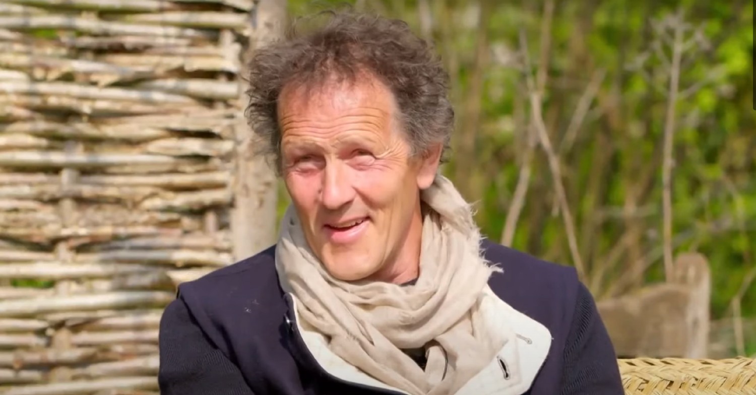 monty Don smiling during an interview wearing a scarf