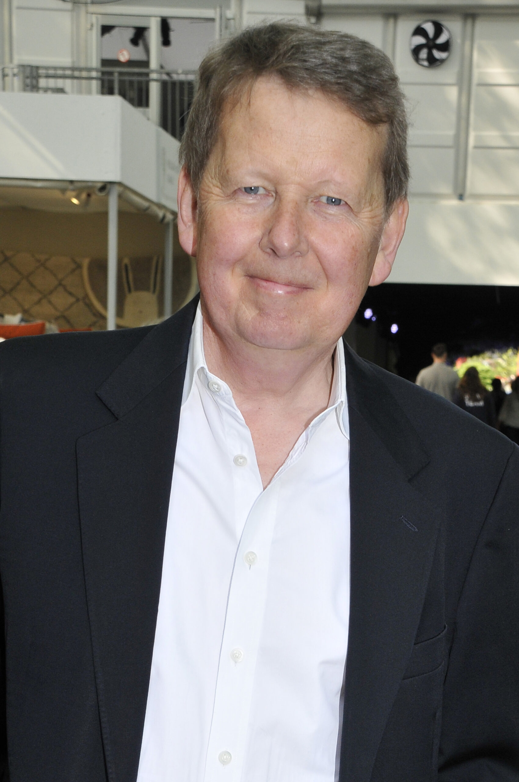 Strictly star Bill Turnbull smiles at camera 