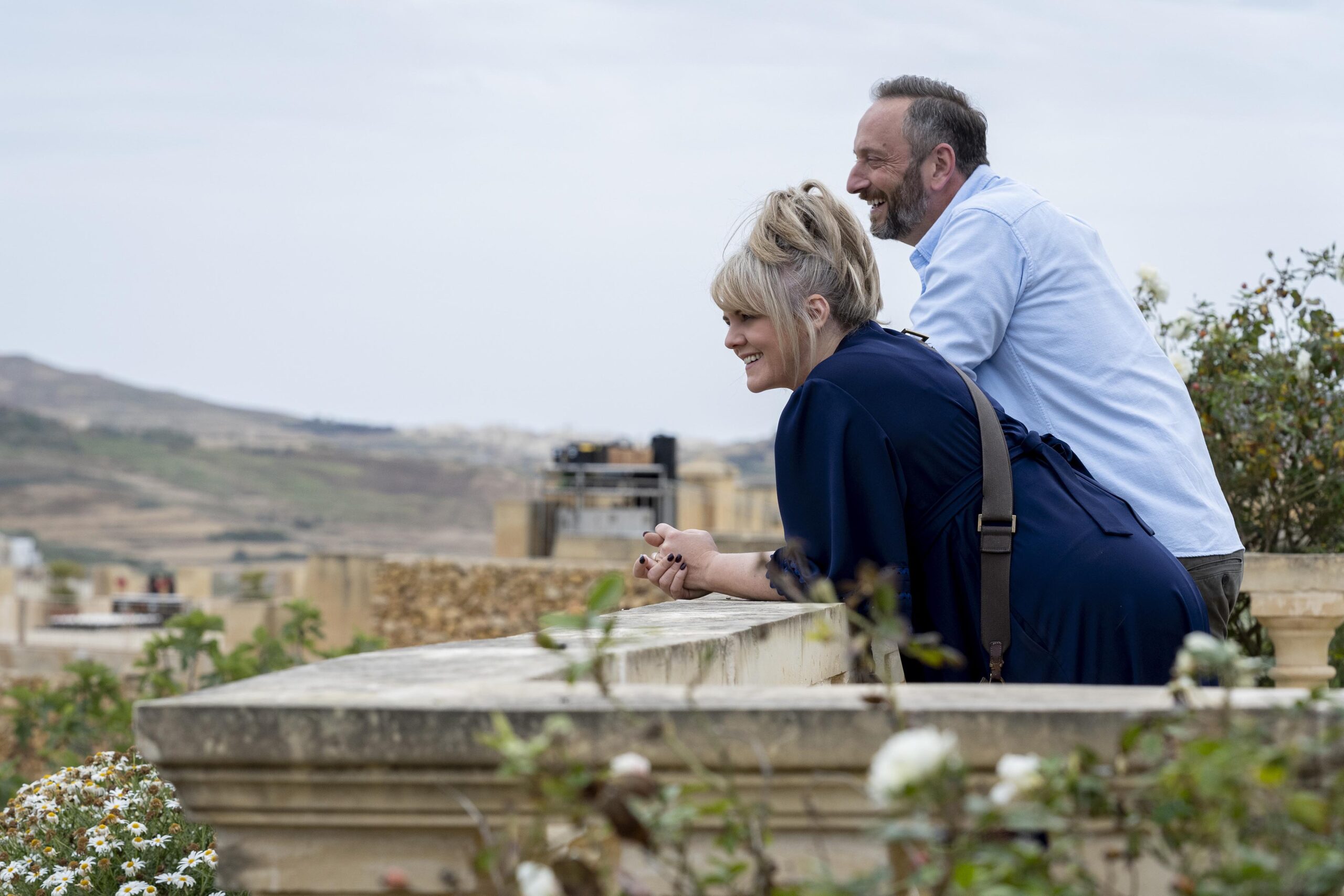 Sally Lindsay as Jean and Steve Edge as Dom - The Madame Blanc Mysteries _ Season 1, Episode 2 - Photo Credit: Mark Cassar/AcornTV