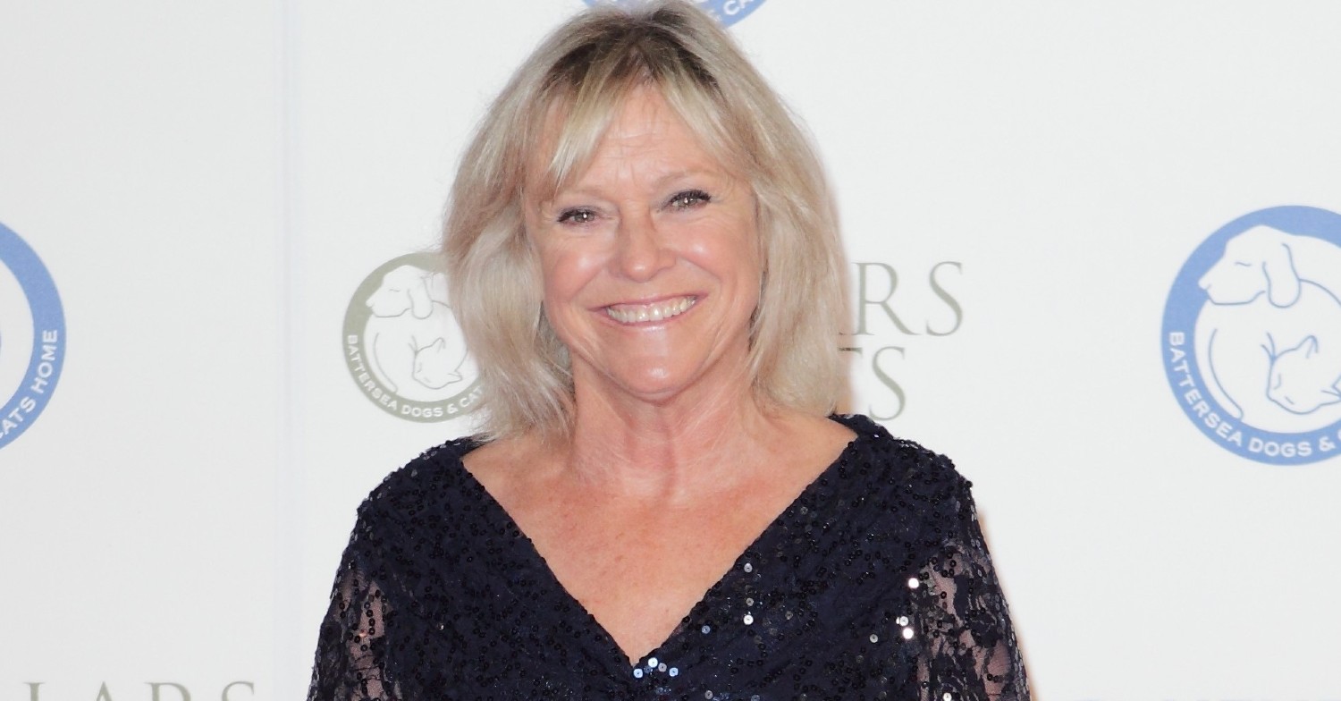 Sue Barker smiling at The Collars And Coats Gala Ball
