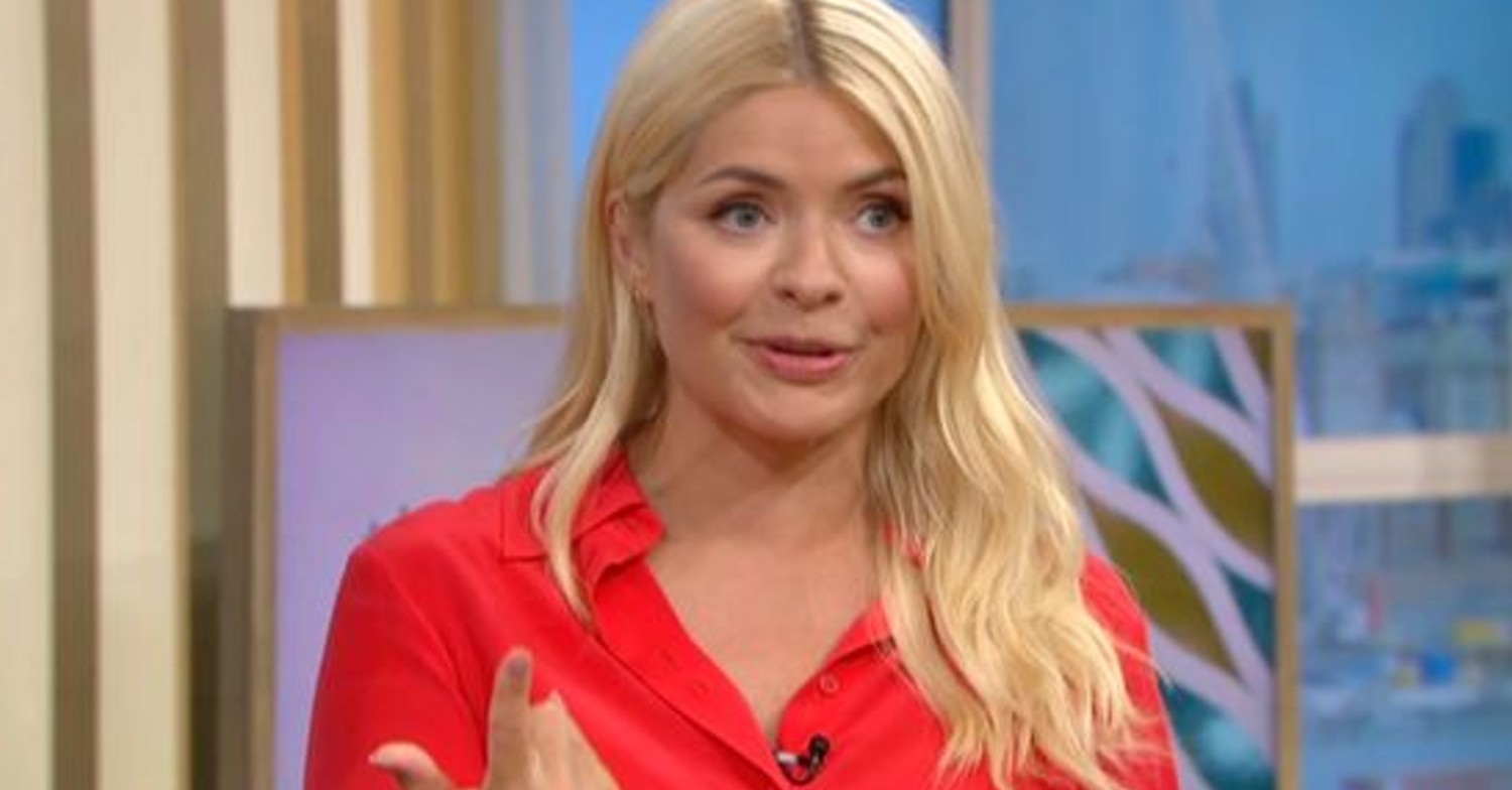 Holly Willoughby smiling wearing red on ITV This Morning