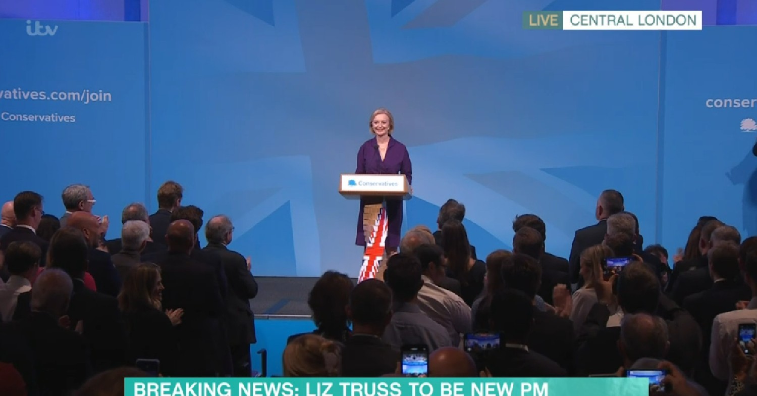 Liz Truss speaking to an audience as new prime minister