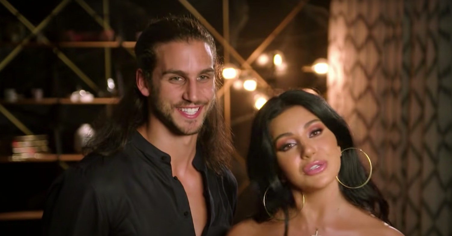 Michael Brunelli smiling while Martha Kalifatidis is pouting on MAFS Australia