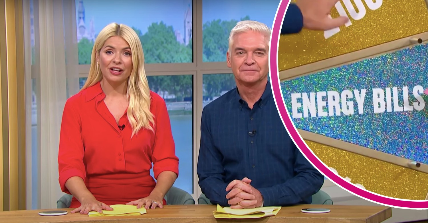 Holly and Phill smiling on This Morning alongside Spin to Win wheel