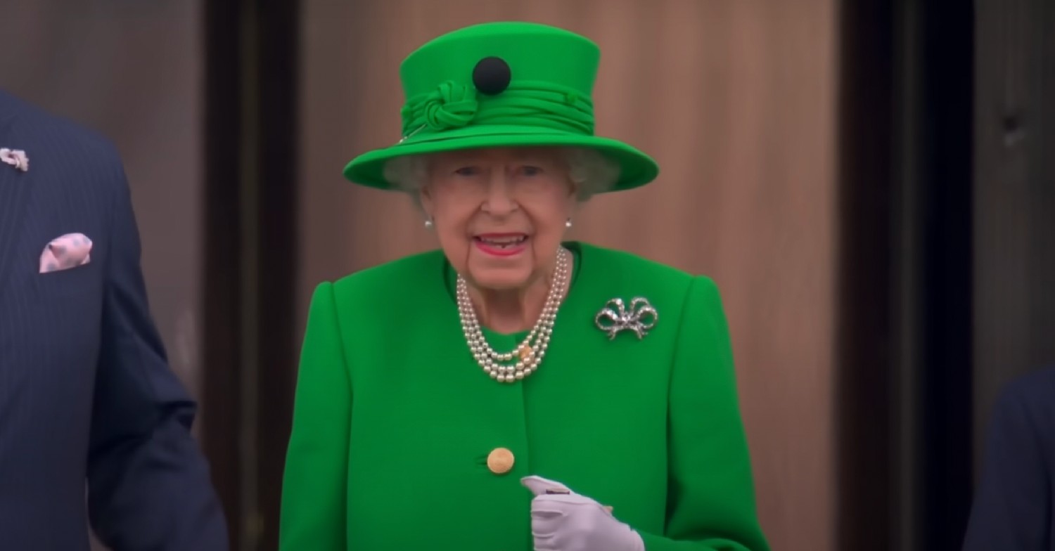 The Queen in a green outfit 