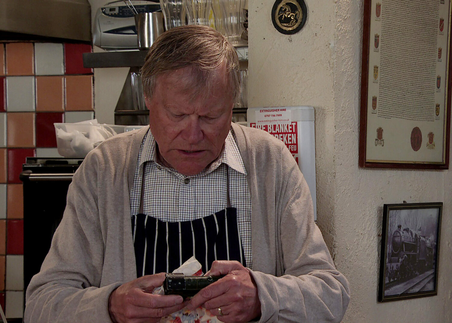 Roy looking down in Coronation Street 