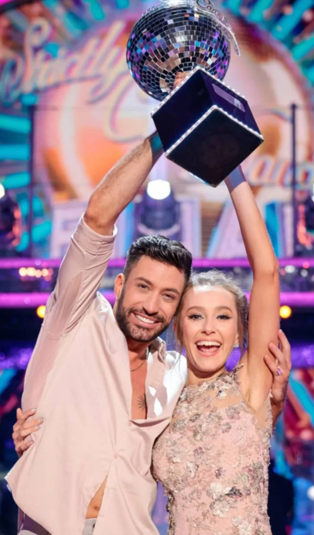 Giovanni Pernice and Rose Ayling-Ellis holding up the Strictly trophy