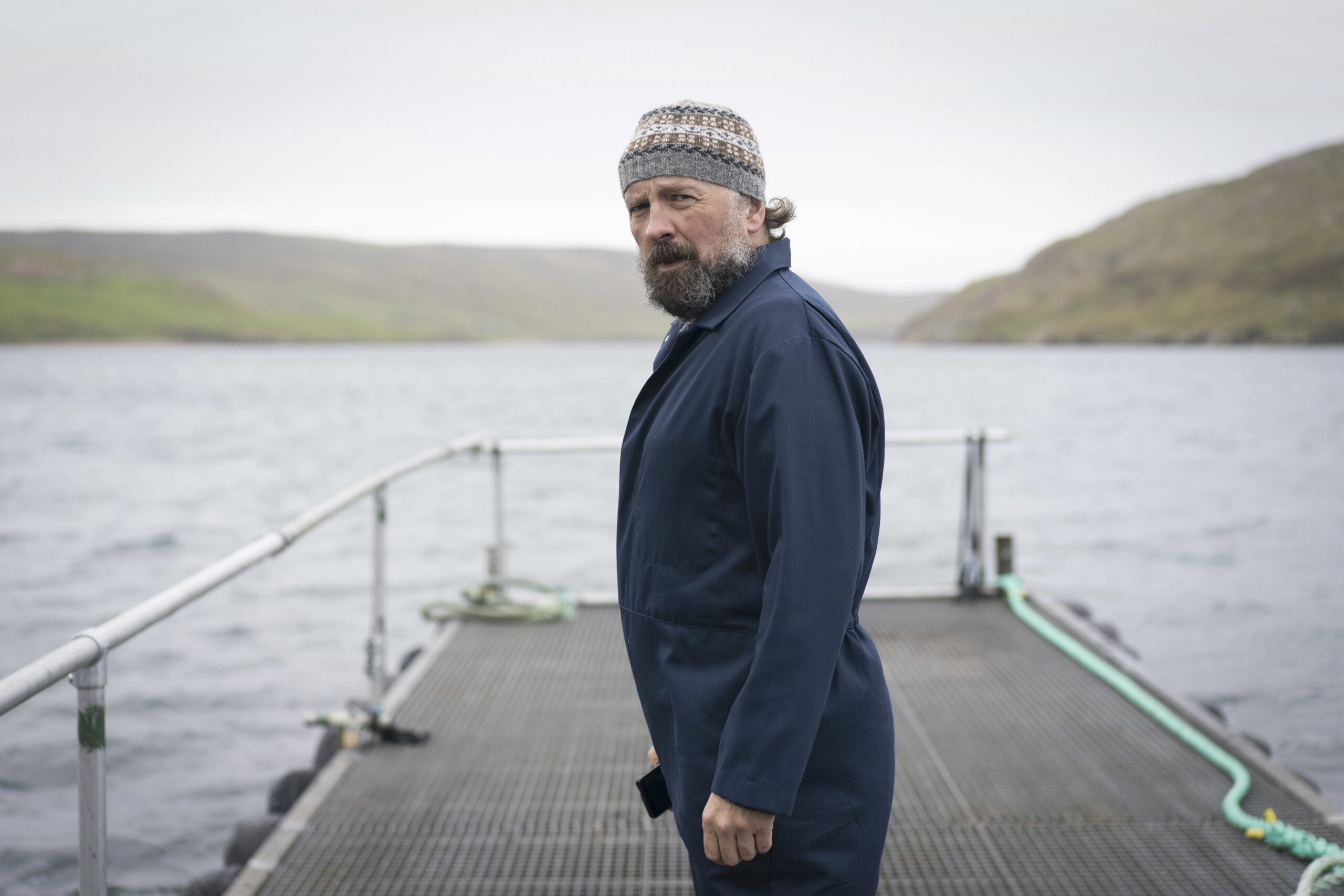 KEITH FLEMING staring at camera as Gregg Flett in Shetland