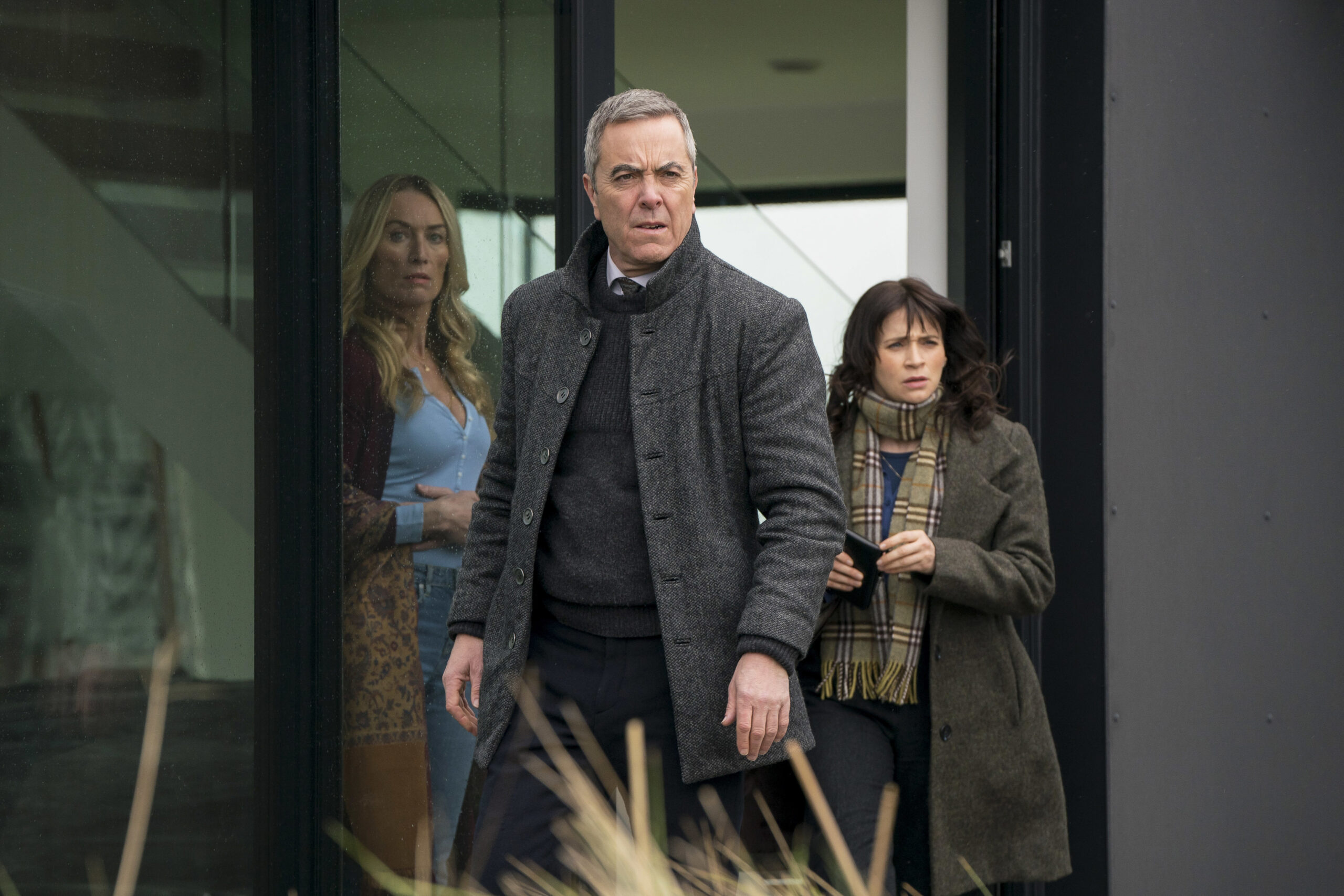 Bloodlands,First Look,Olivia Foyle (VICTORIA SMURFIT), Tom Brannick (JAMES NESBITT), Niamh McGovern (CHARLENE McKENNA) They are outside a house, and Tom has an anxious look on his face