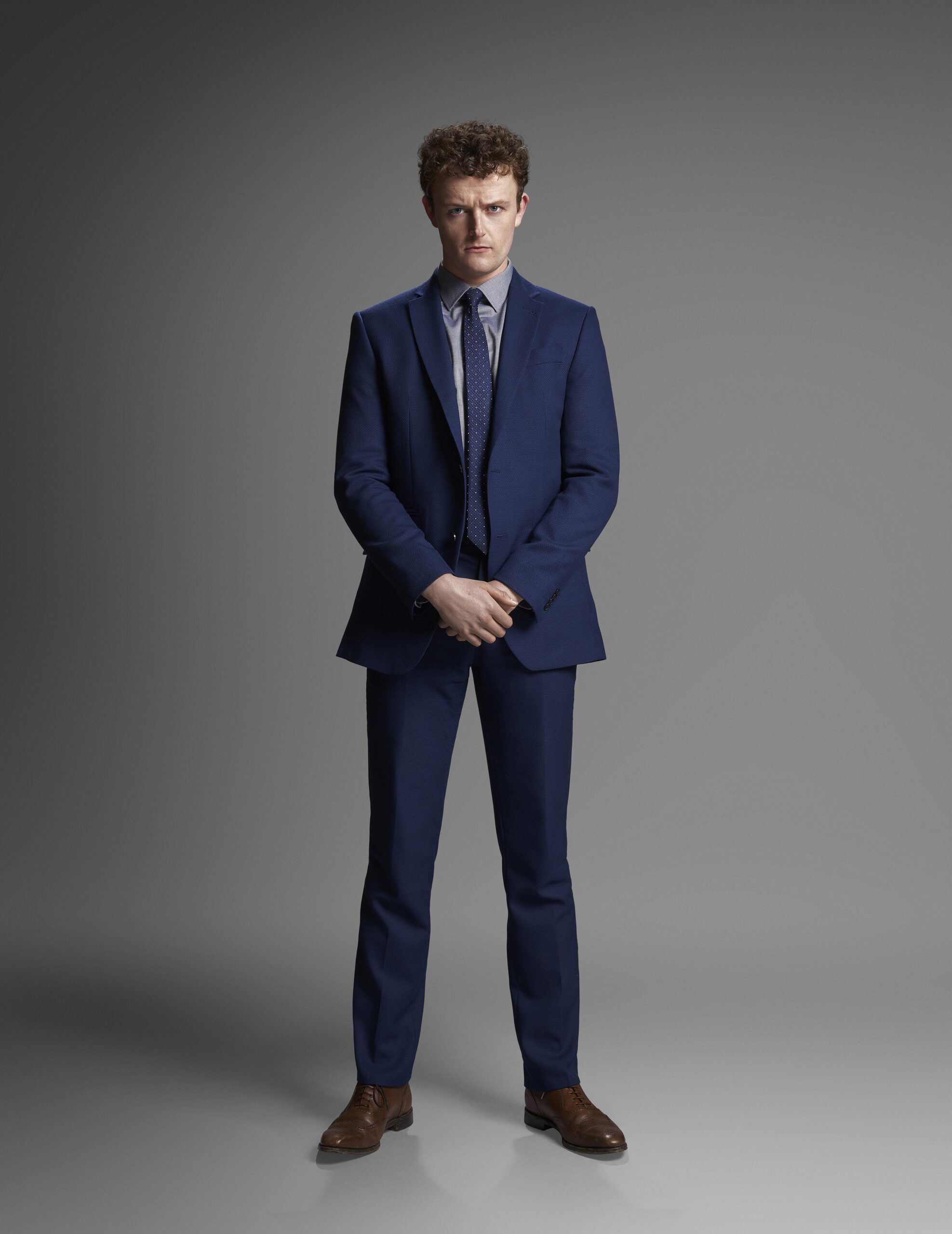 Bloodlands,Character Portraits, 'Birdy' (CHRIS WALLEY) DC, He in a suit with his head bowed down